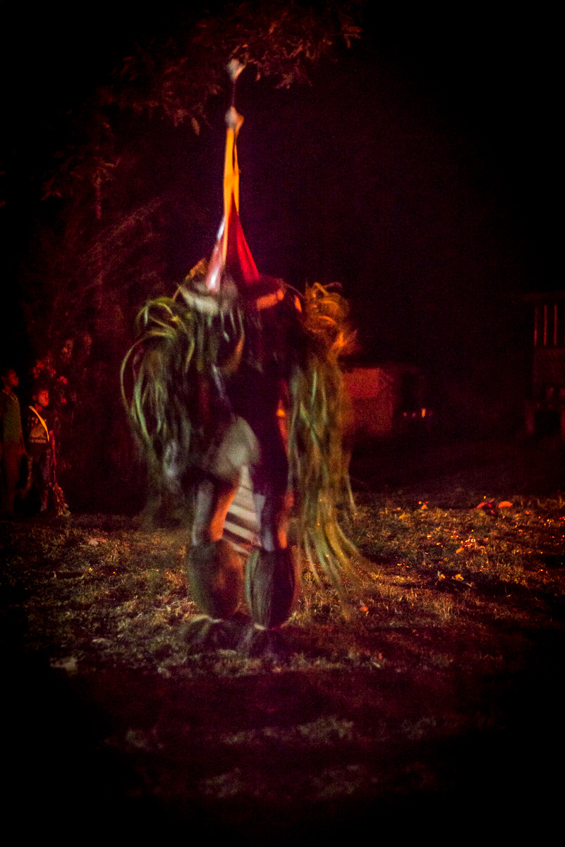 A Shaman evokes the night spirits, paving the way for the Baining Fire Dance