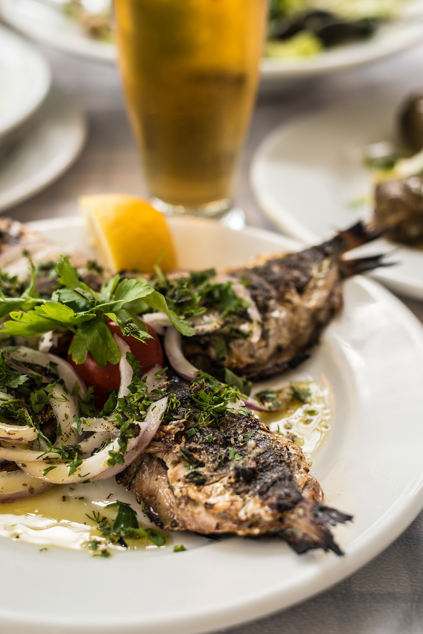 Grilled sardines stuffed with herbs at Restaurant To Psaraki, Vlychada Harbour