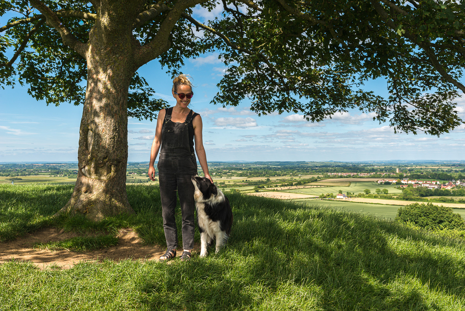 Matilda and Scruff the dog on Burrow Hill overlooking the orchards at Barrow Hill Cider