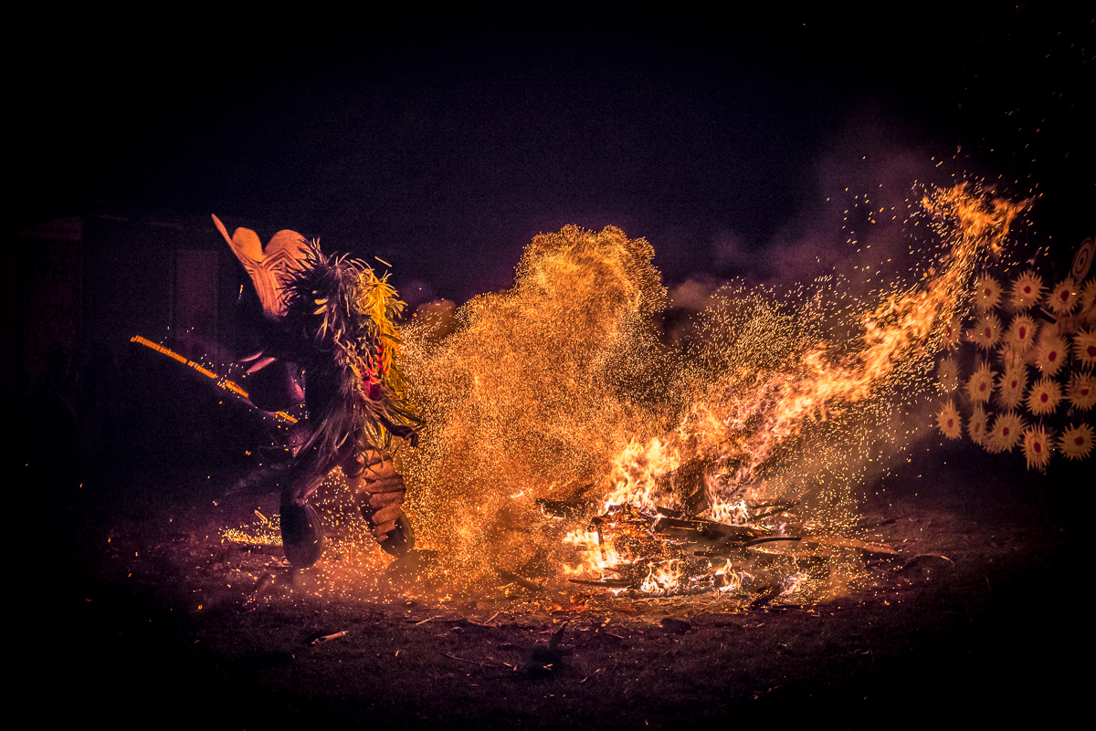 As the trance takes the dancers the fire dance begins in ernest