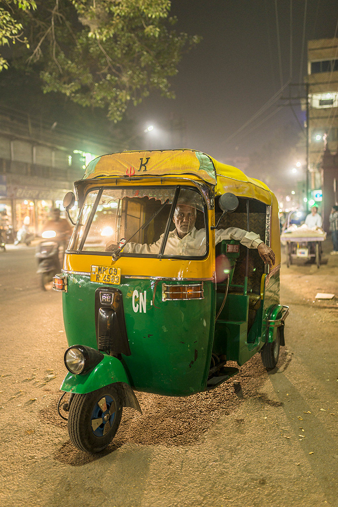 Tuk-tuk driver takes a break... he's not quite sure if I need a ride