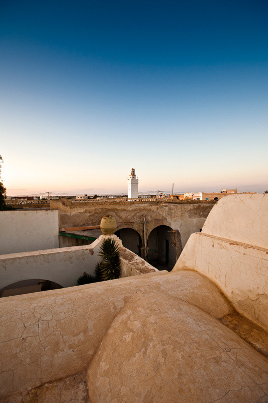 The town mosque visible accross the rooftops of Erriadh, an old jewish enclave that is about to be turned in to a luxurious boutique hotels, Djerba Island