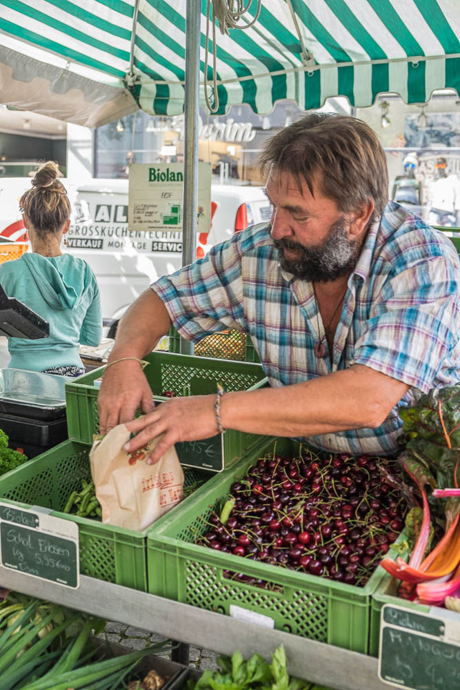 Hans Peter ('Hap') Bruchmann, selling his in-season cherry's, Bregenz farmers market
