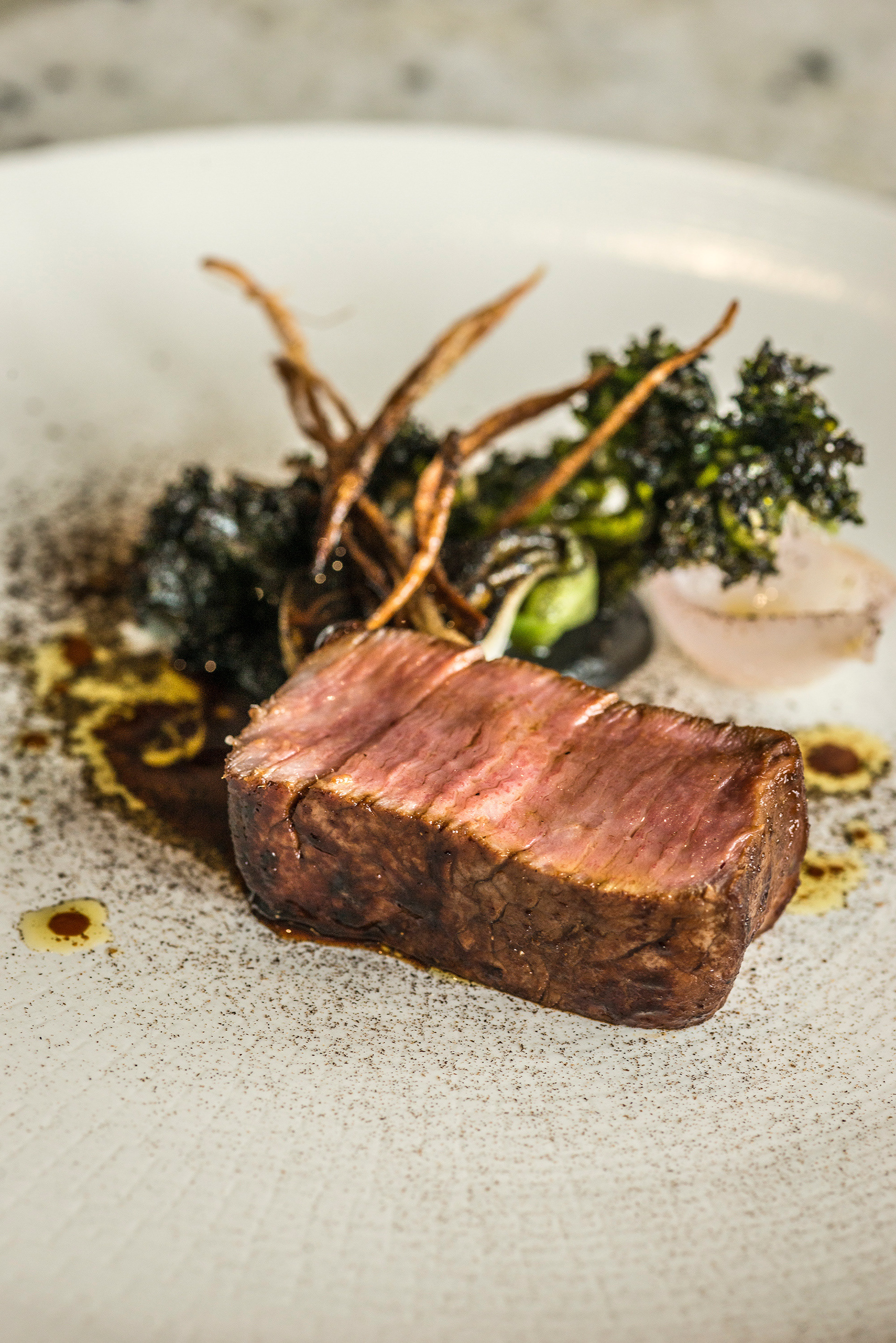 Aged rare breed beef with miso caramel, alliums, crispy kale dusted with soot at Northcoate Michelin star restaurant, Langho, Blackburn, Lancs
