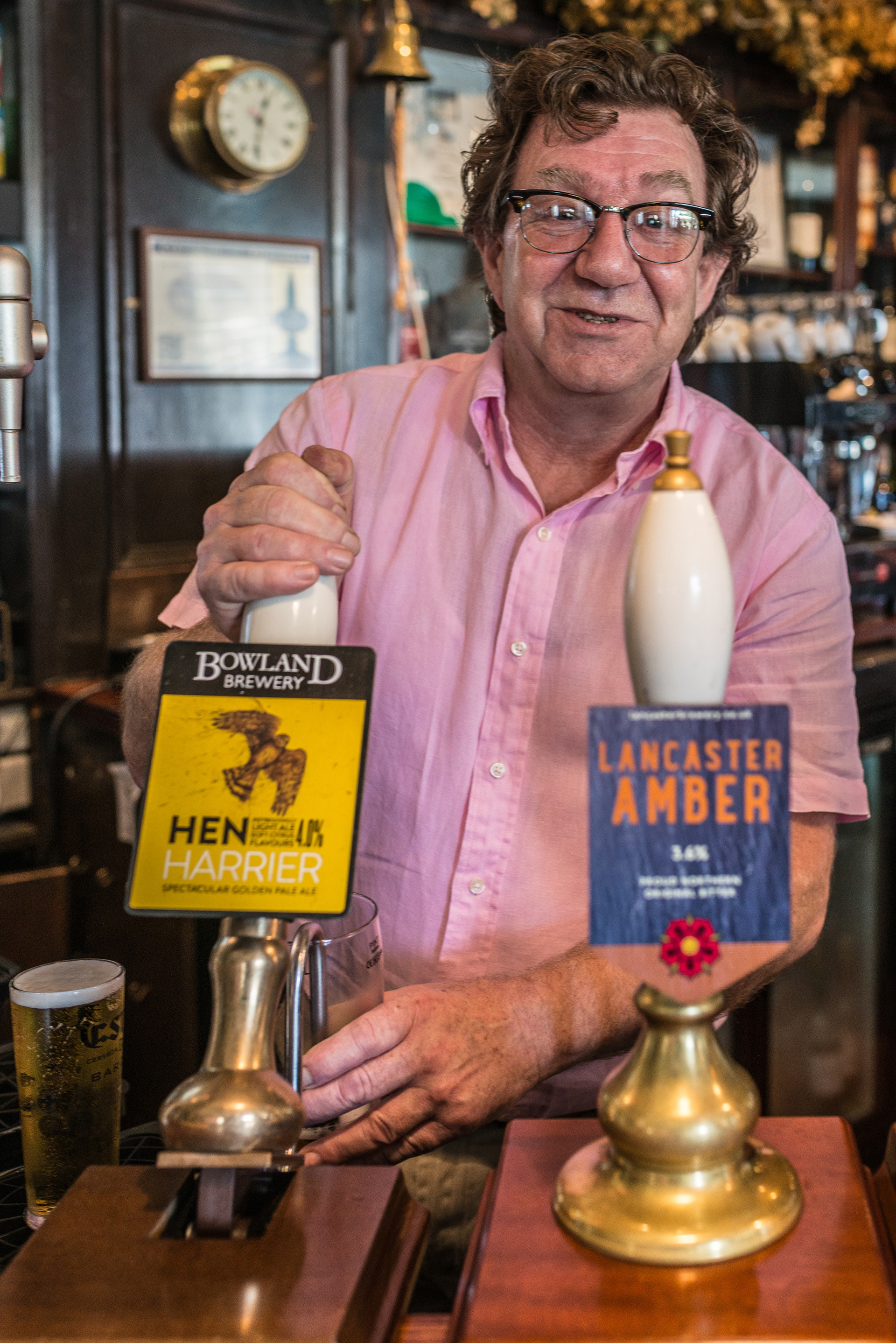 Landlord Adrian Nolan pulling pints at the Parkers Arms, Newton-In-Bowland, Lancs.