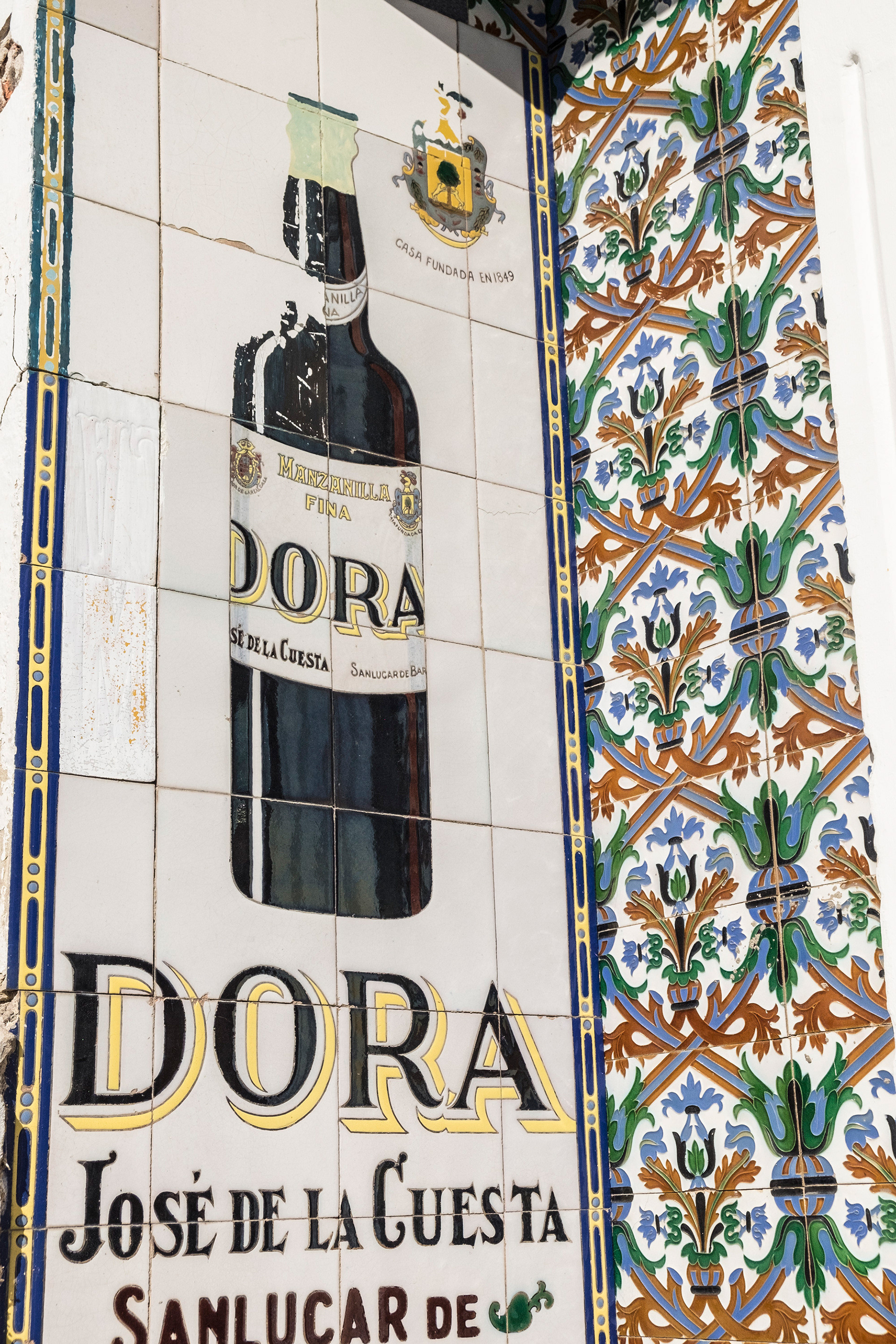 A typical bar sign in the Centro Historico, Comillas