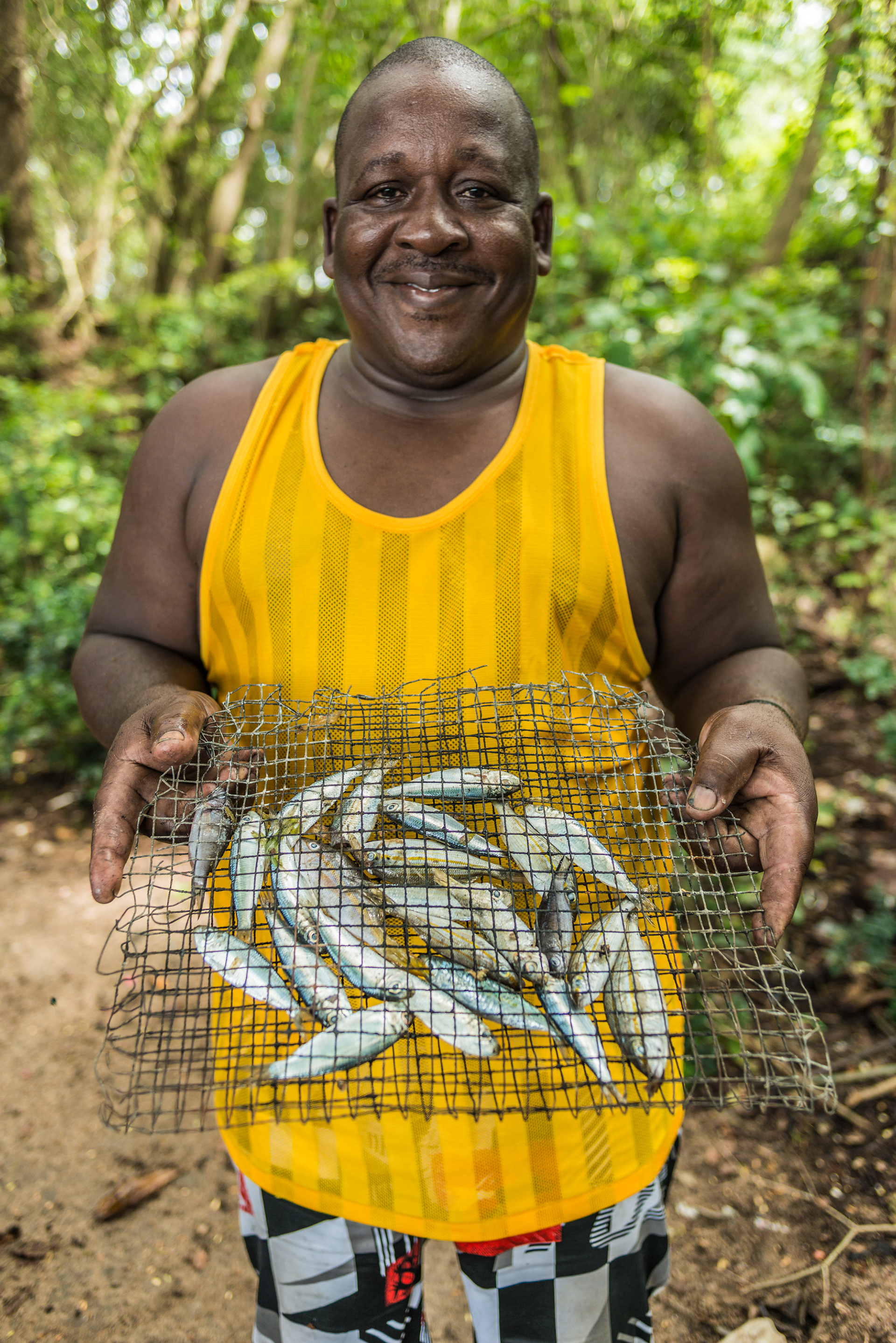 Grilling sprats at an impromptu BBQ with Chef Julio & friends at Rodney Bay beach, in St Lucia, it seems any time is party time!