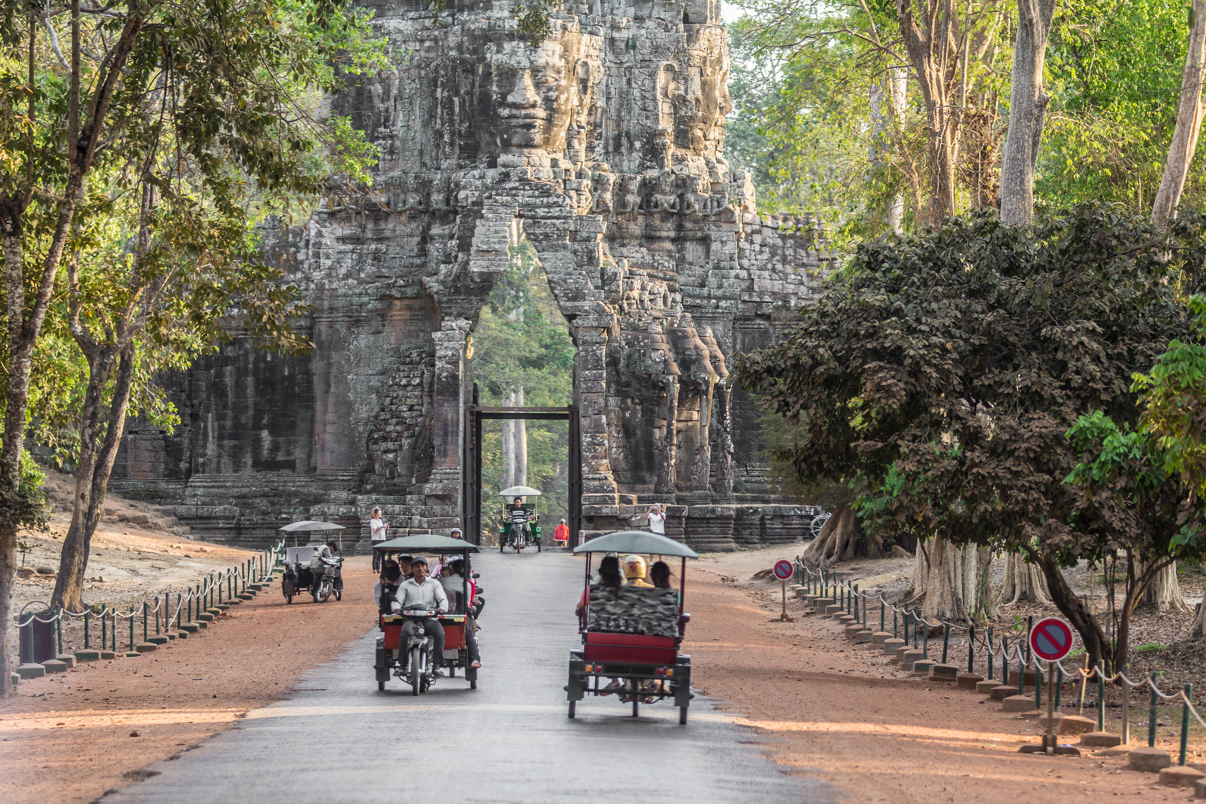 Tuk Tuk transport at the North Gate entrance to Angkor Thom (Anchient City), Angkor Complex, Cambodia.