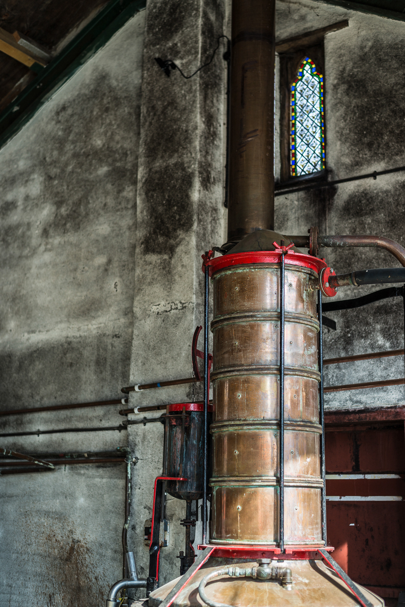 The old but working copper brandy still at Barrow Hill Cider