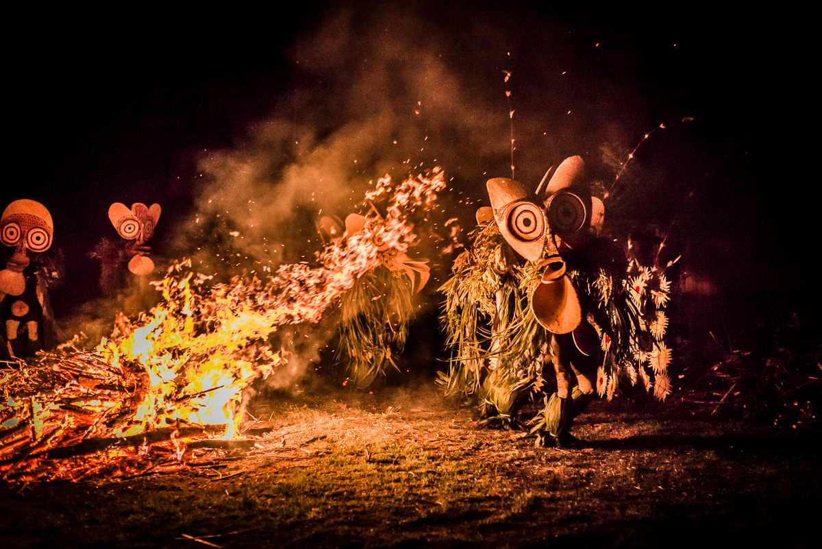 The fire is built up to a massive hight while the dancers circle and chant in time with the hipnottic drums