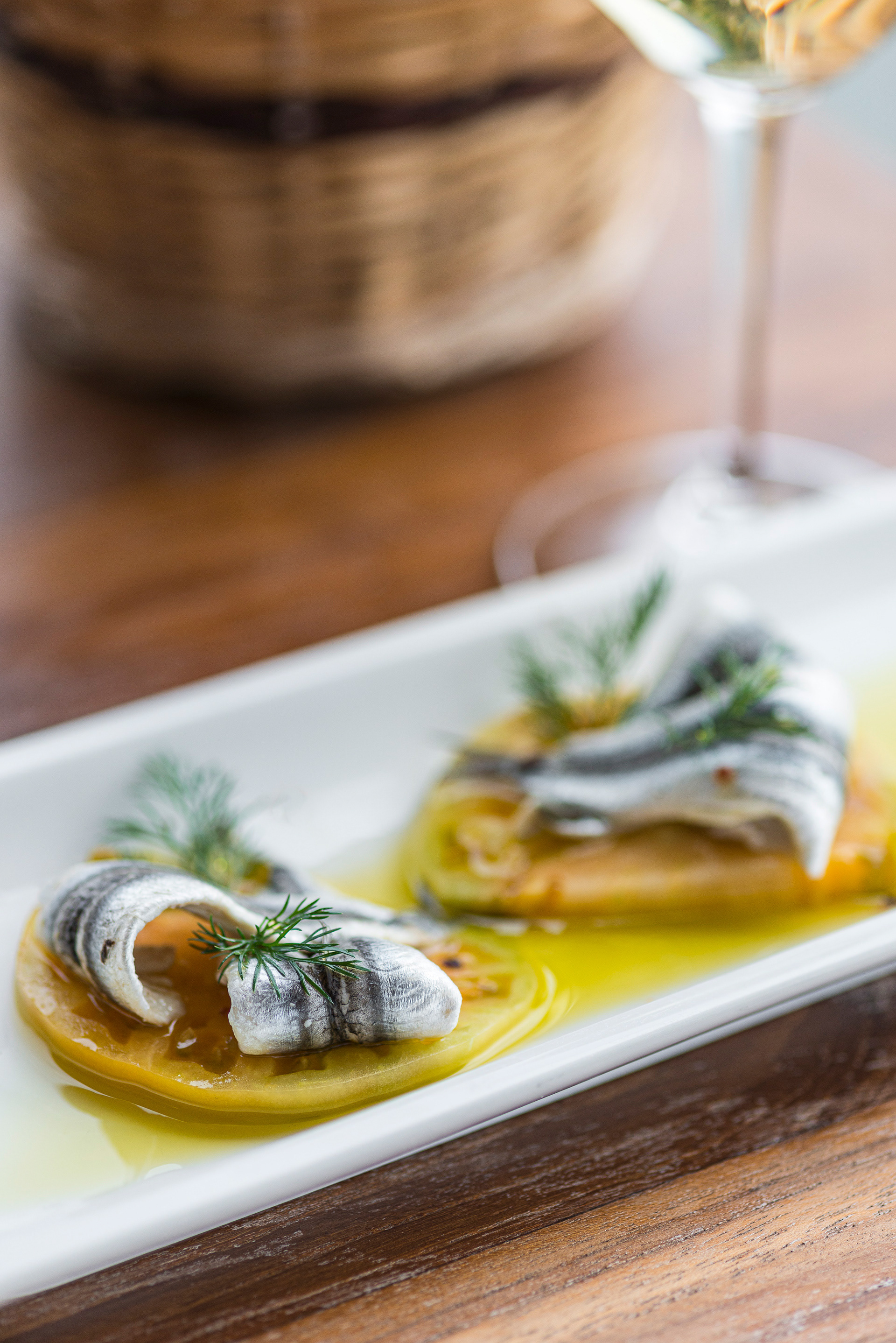 Pickled Sardines on fresh Tomato with olive oil at restaurant Thalassaki at Ormos Beach, Ysternia Bay, Tinos