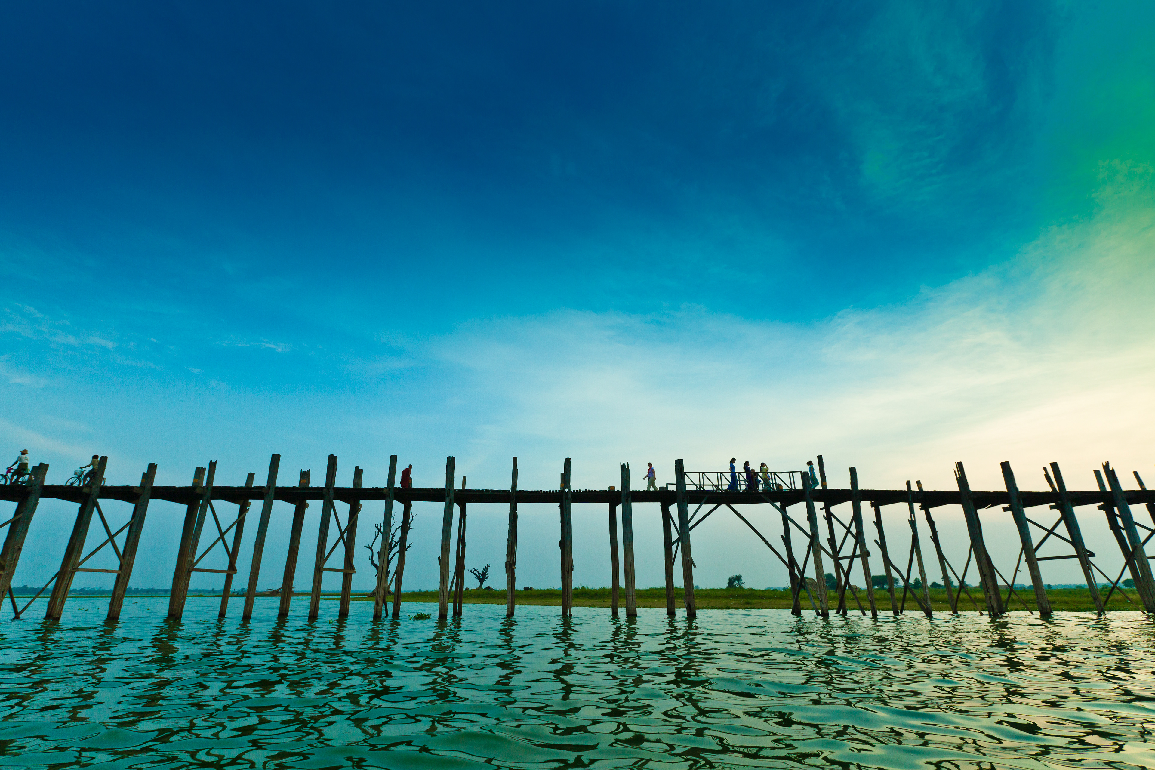 Sunset from the water, U Bein's Bridge, Mandelay, Burma