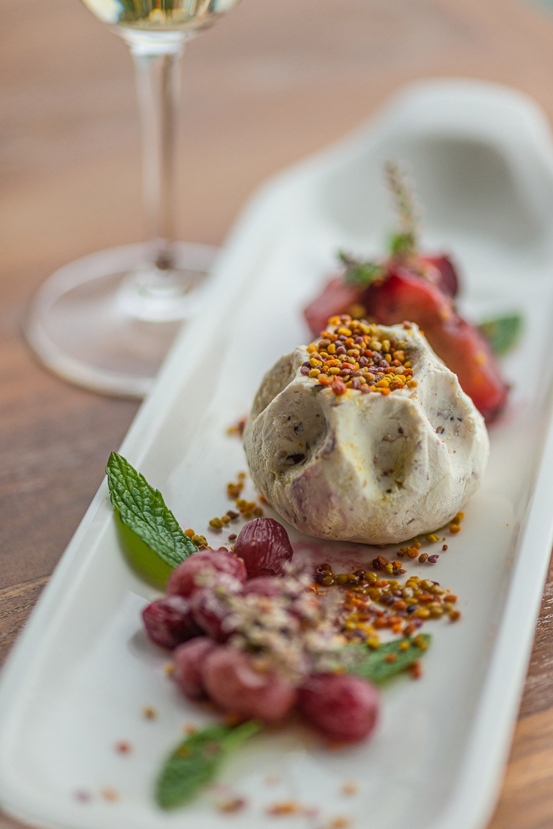 Strongylo goats cheese with marinated Plums, Grapes and Bee Pollen at the very fashionable and popular Thalassaki Restaurant at Ysternia Bay, Tinos