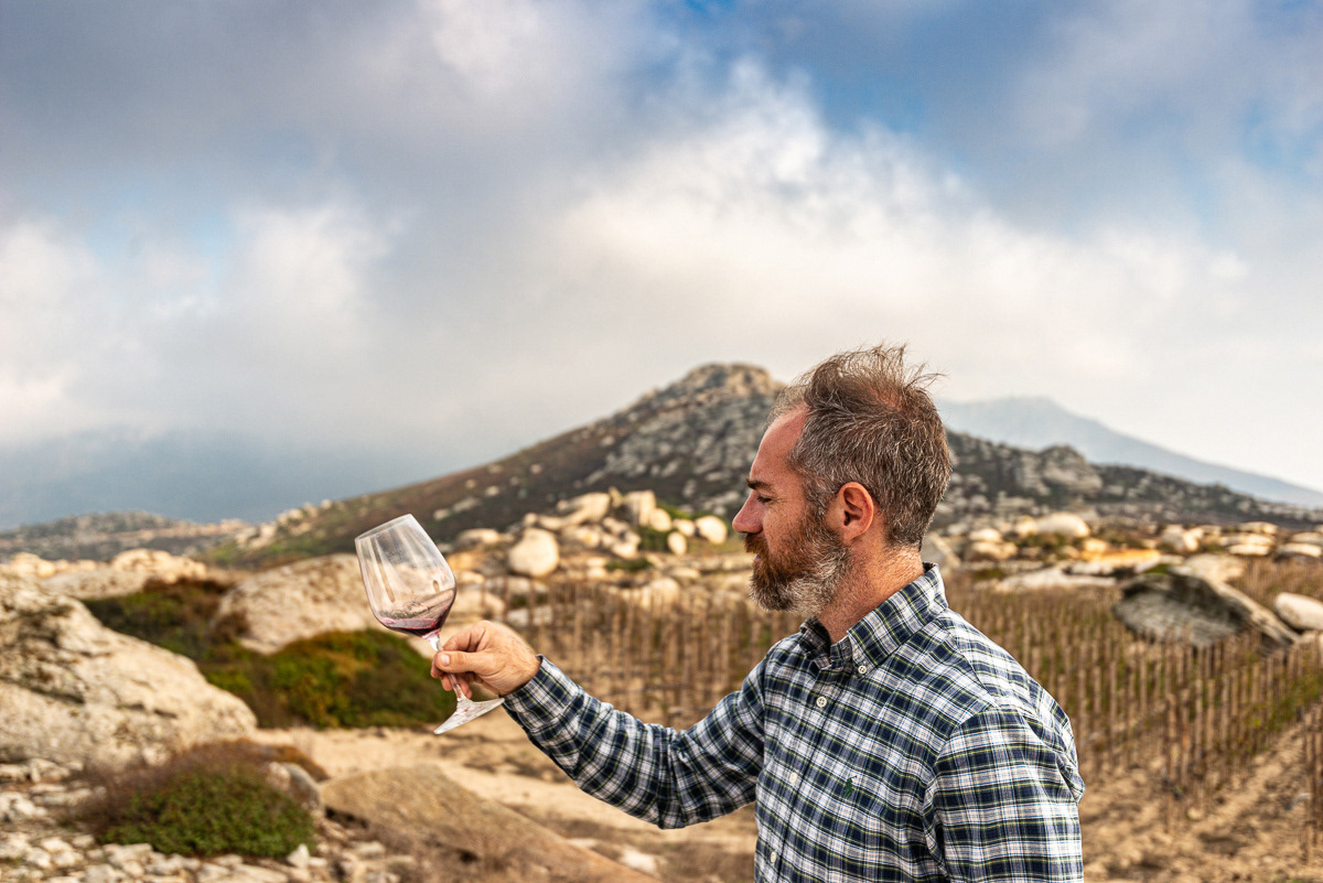 Wine Maker Mr Georgilas tasting at winery Toinos, Tinos
