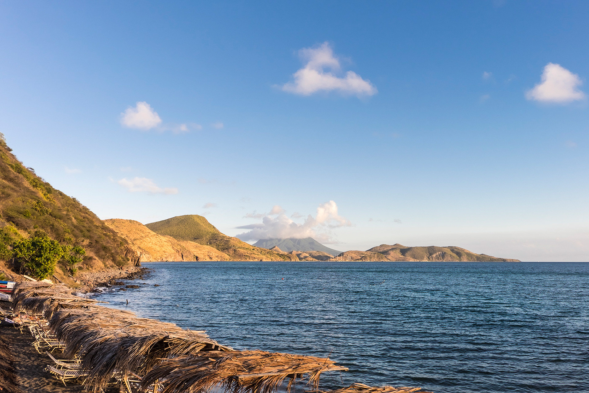 Nevis topped with clouds from Shipwreck Beach Bar, St Kitts