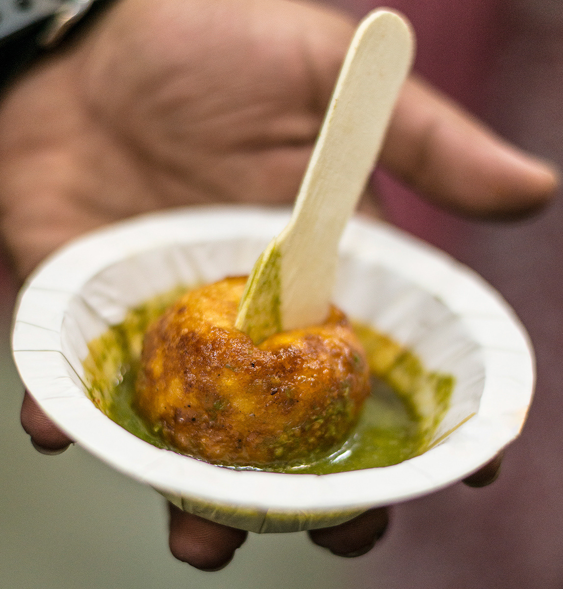 Vijay Chaat in Sarafa, a coconut pattie with chilli and Jagery - People travel from miles around to taste this unassuming looking dish but it is truly delicious!