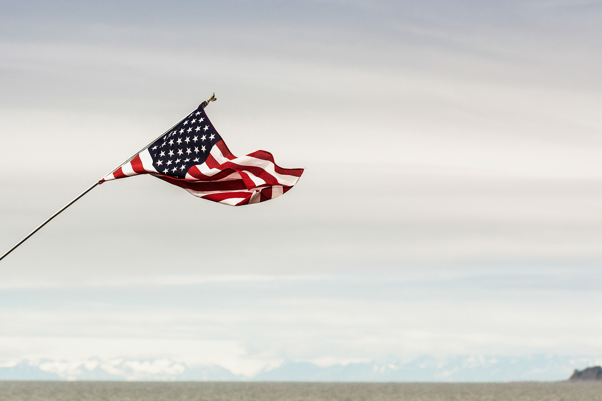 The 49th State, Stars and Stripes flying in Homer Spit, Alaska