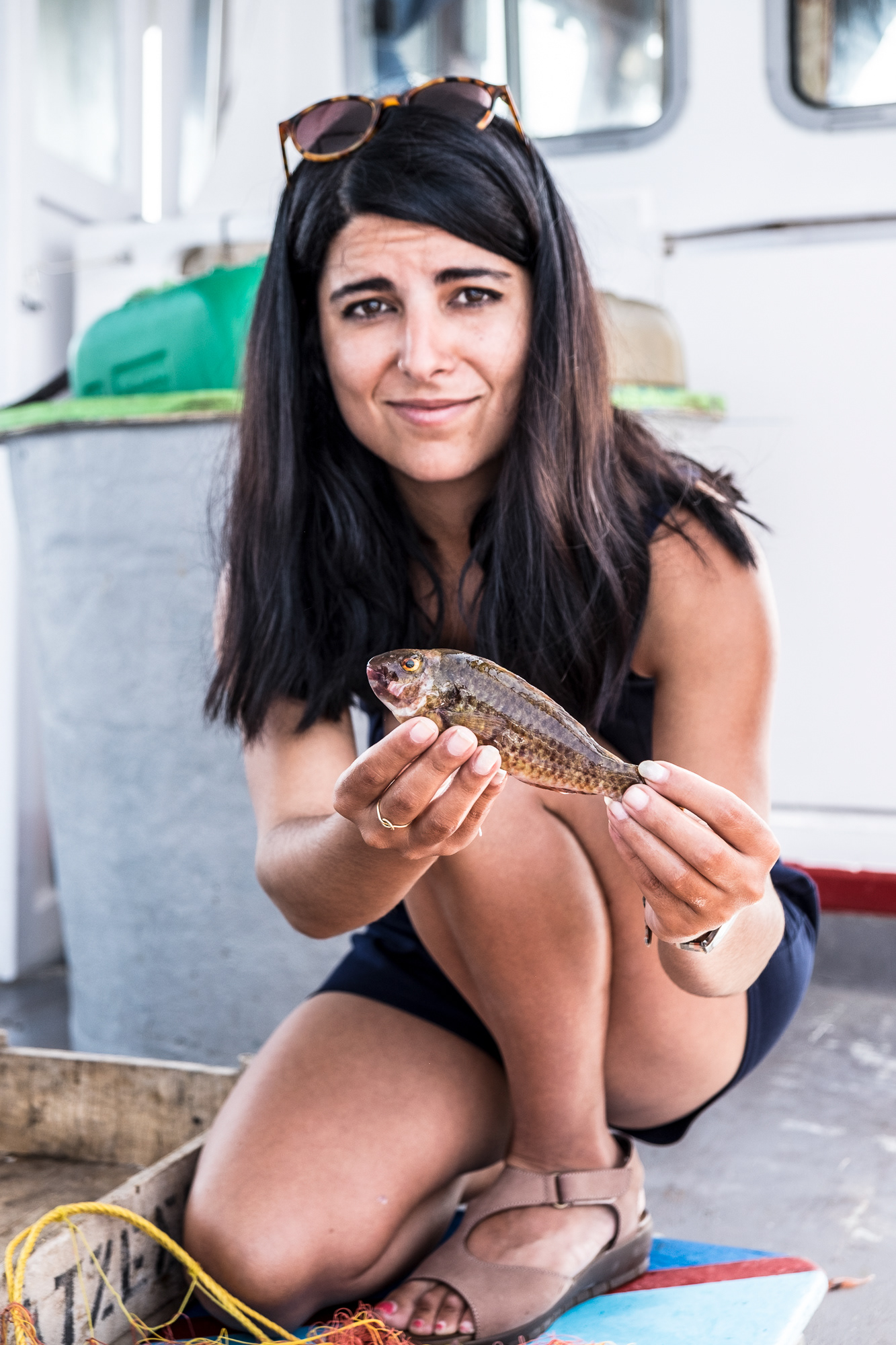 Captain Anthi Arvaniti, daughter of four generations of Santorini fishermen takes us out for the mornings catch. She has the only authorised fishing boat trip on the island from the harbour at Vlychada