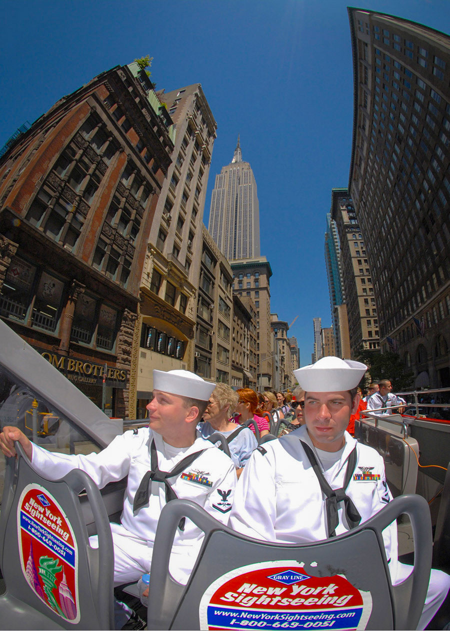 090521-N-4856C-240NEW YORK (May 21, 2009) Aviation Structural Mechanic 3rd Class Michael Spiegler and Aviation Structural Mechanic 3rd Class Dustin Davis, both assigned to Helicopter Mine Countermeasures Squadron (HM) 14, ride a double-decker tour bus in Manhattan during Fleet Week New York City 2009. Approximately 3,000 Sailors, Marines and Coast Guardsman will participate in the 22nd commemoration of Fleet Week New York. This event will provide the citizens of New York City and the surrounding tri-state area an opportunity to meet service members and also see the latest capabilities of today's maritime services. (U.S. Navy photo by Mass Communication Specialist Seaman Christopher L. Clark/Released)