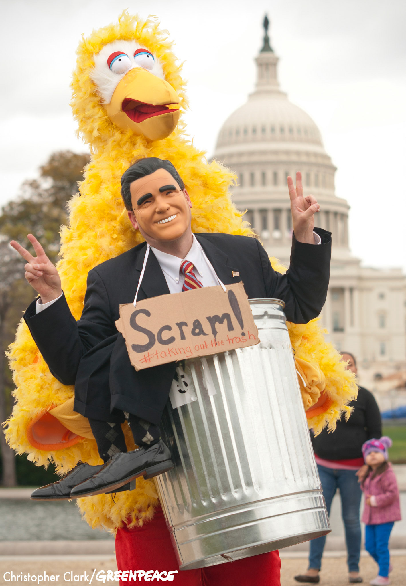 Marchers, and puppets, gather at the Capitol Reflecting Pool following the Million Puppet March on the Washington, DC mall Nov. 3rd, 2012. The Million Puppet March, a rally against the Republican presidential candidate Mitt Romney's debate remarks about Big Bird and cutting PBS funding if elected, started in Lincoln Park and ended at a Capitol Reflecting Pool rally with an estimated 600 in attendance.
