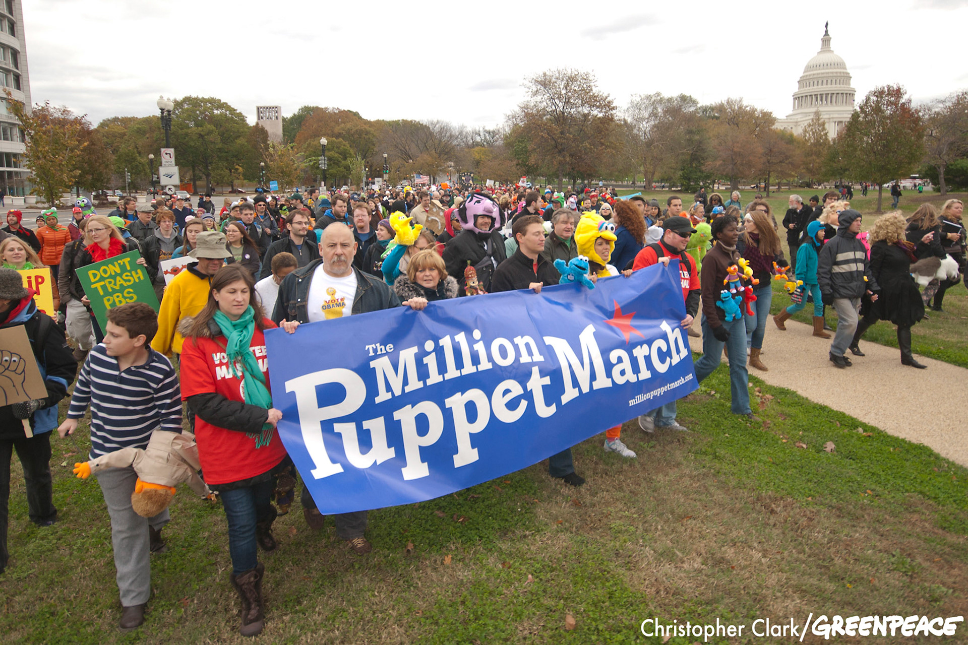Marchers carry a banner for the Million Puppet March on the Washington, DC mall Nov. 3rd, 2012. The Million Puppet March, a rally against the Republican presidential candidate Mitt Romney's debate remarks about Big Bird and cutting PBS funding if elected, started in Lincoln Park and ended at a Capitol Reflecting Pool rally with an estimated 600 in attendance.