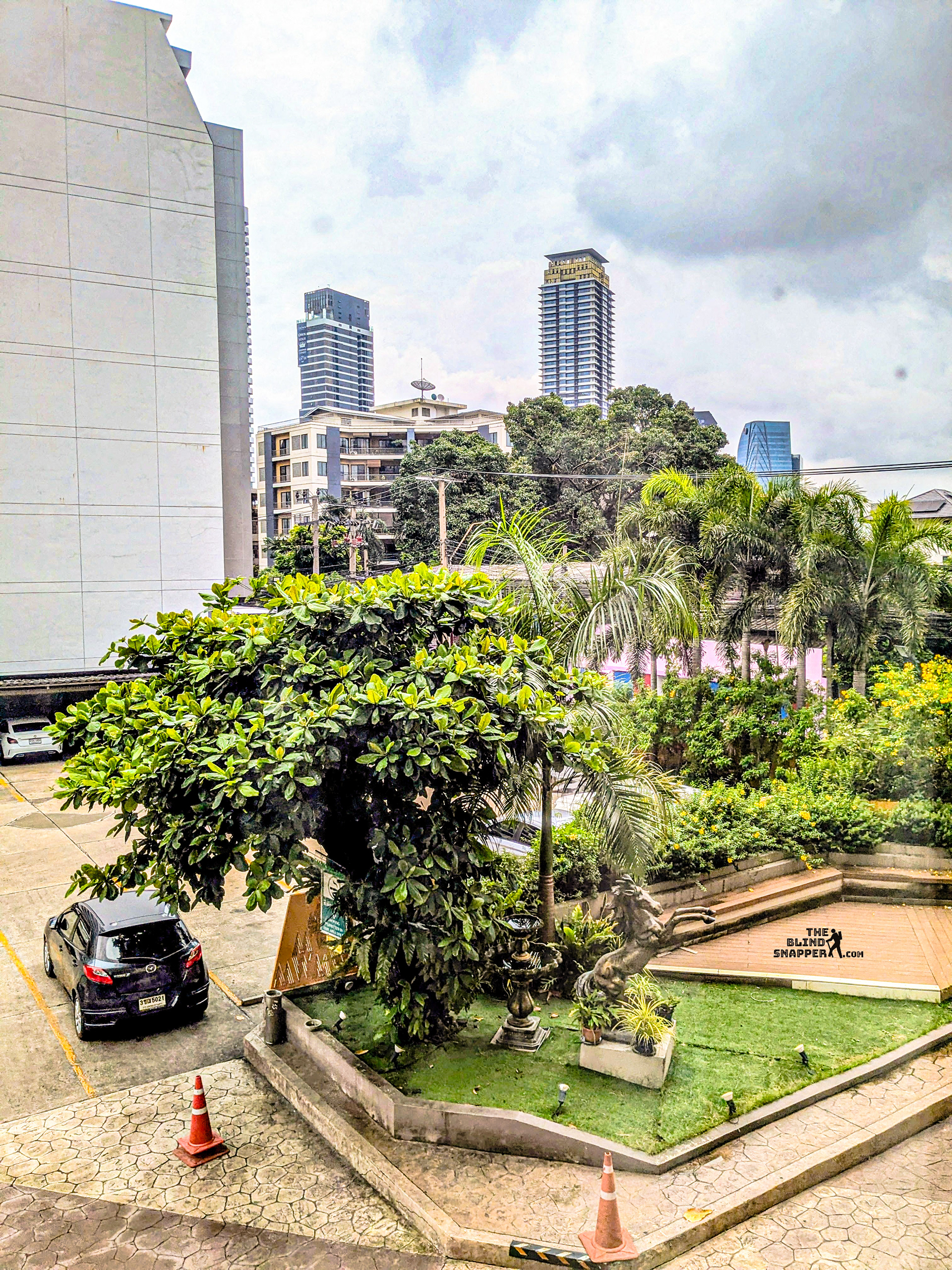Bangkok Skyline and Malaysia Hotel's grounds