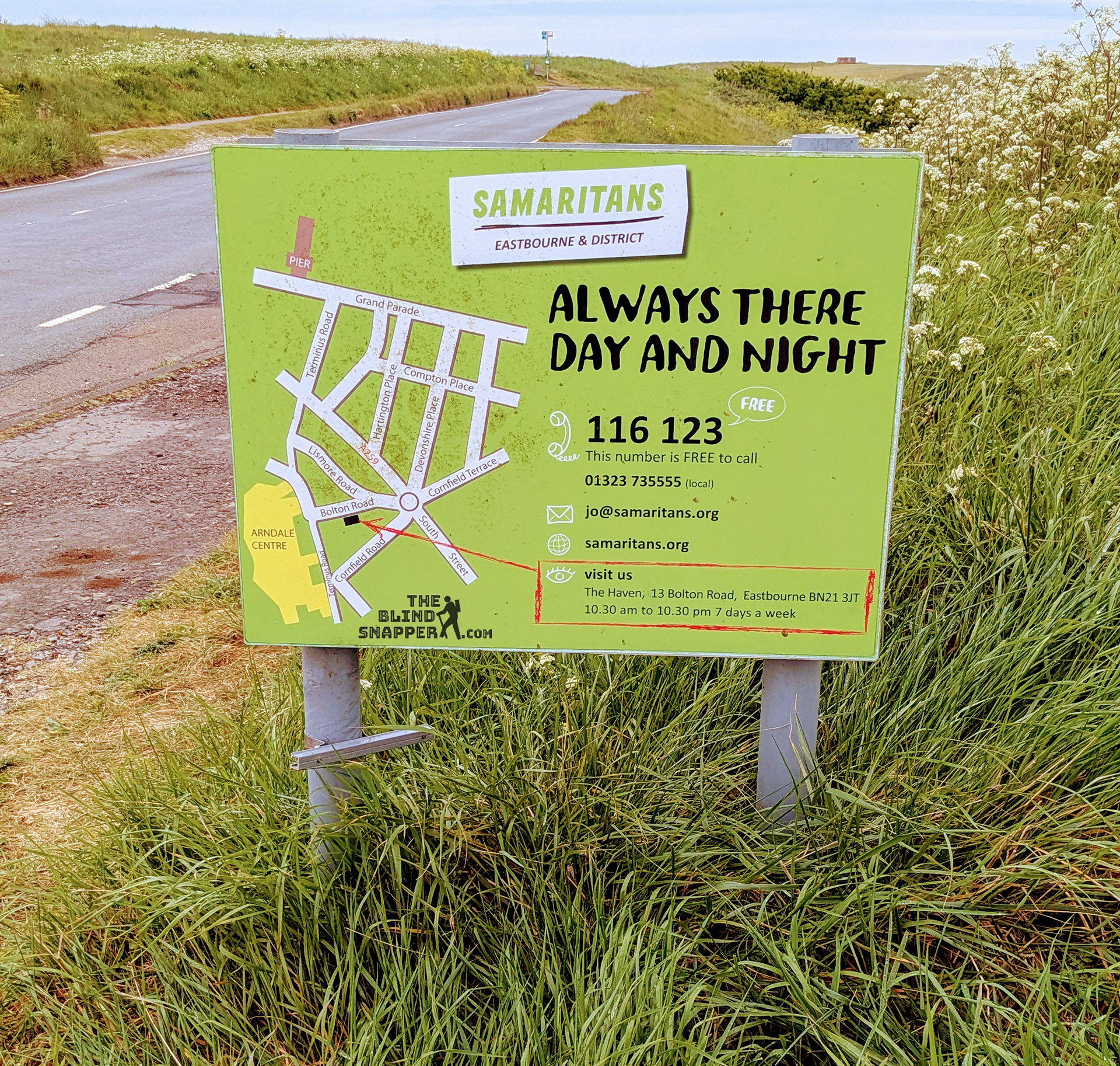 A sign for The Samaritans at Beachy Head on the East Sussex coast