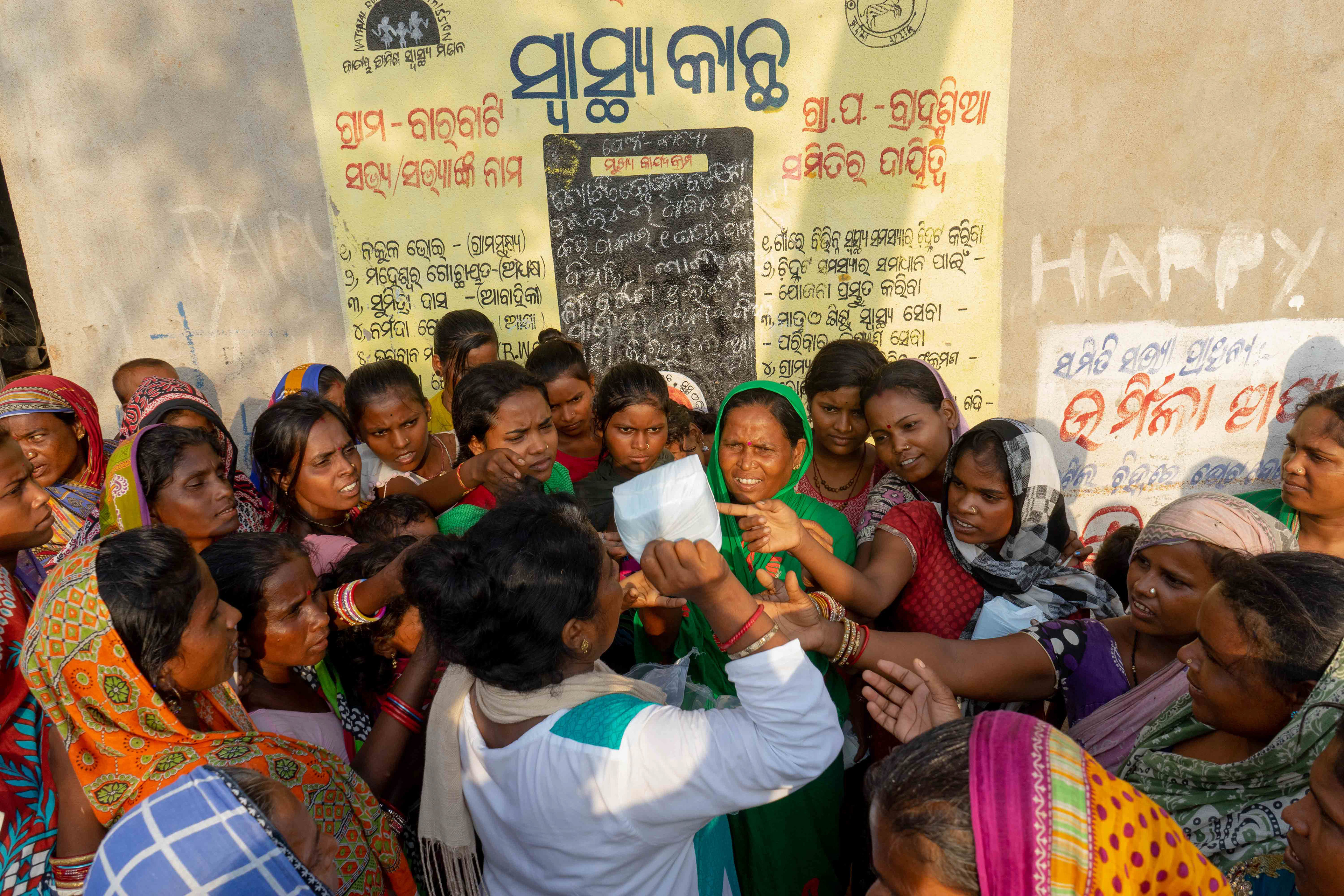 A small scuffle breaks out at Barbhati hamlet occupied by harijans (a term they refer to themselves by) during the distribution of sanitary pads on World Menstrual Hygiene day, May 28th.