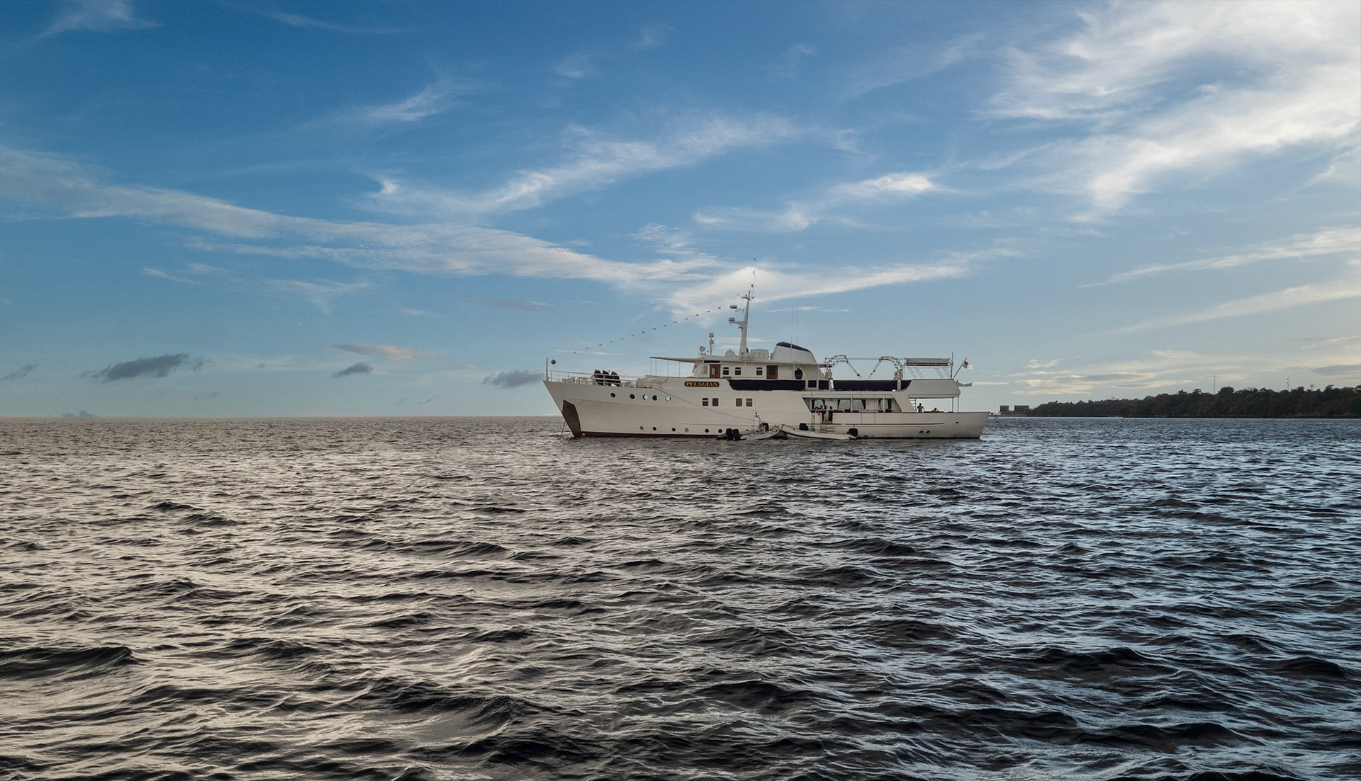 2023 july pelagian yacht we cruised relaxing at sea peaceful southeast sulawesi indonesia© copyright lewis a collins ! http://lewiscollins.au