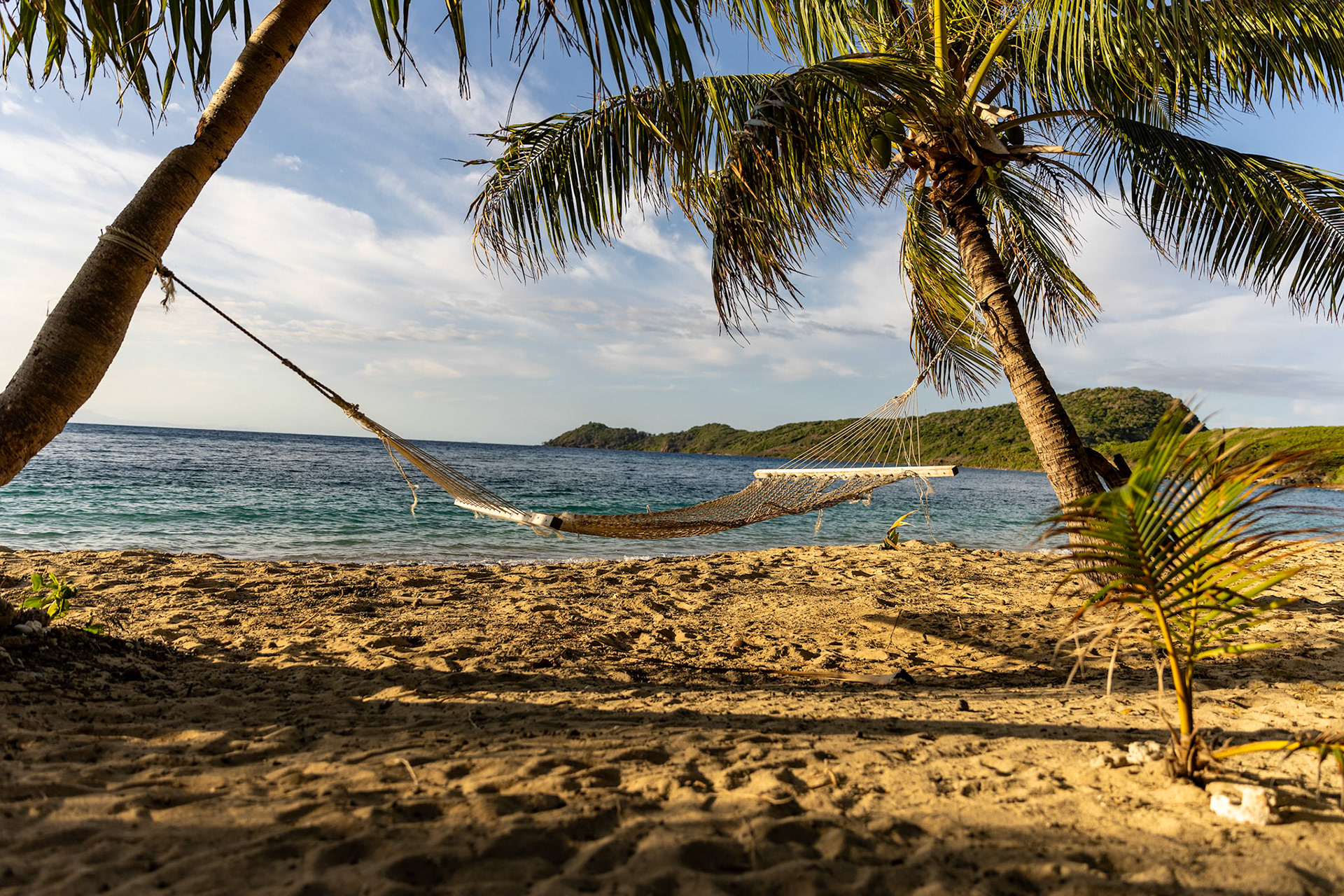 2024 september hammock waiting for you on beautiful beach mantaray island fiji© copyright-lewis-a-collins-photographer-!http://lewiscollins.com.au