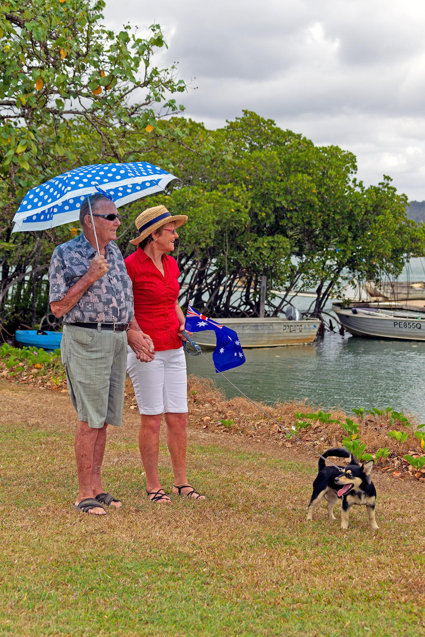 couple standing admiring views with umbrella© copyright Lewis A Collins LCPMTL ! http://lewiscollins.com.au