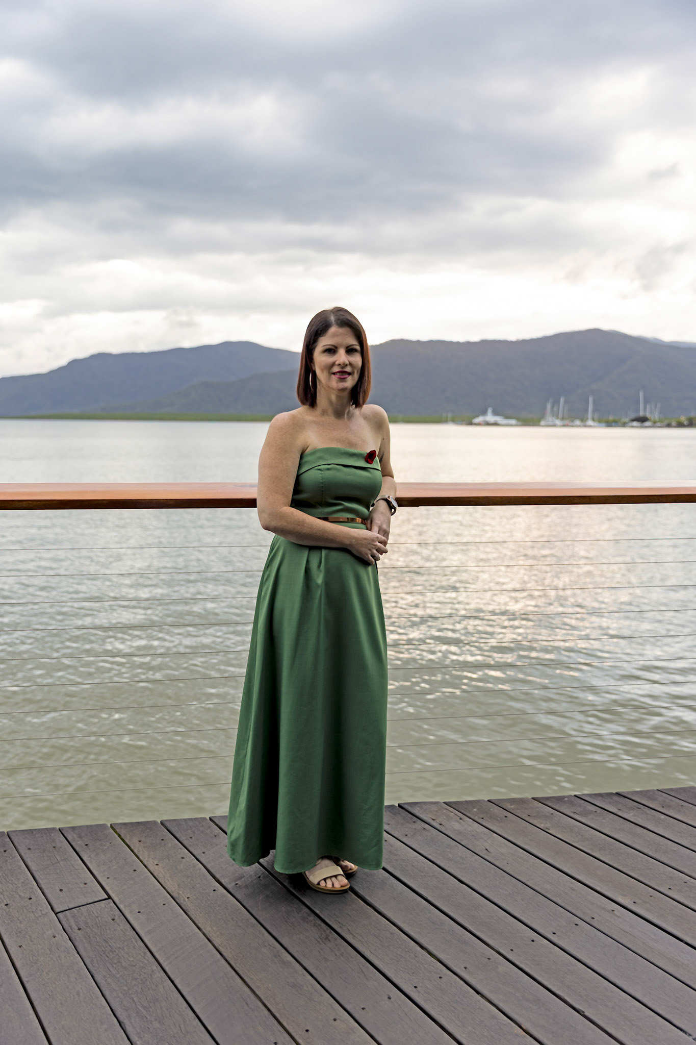 lady smiling standing boardwalk© copyright lewis a collins photographer stock image library http://lewiscollins.com.au