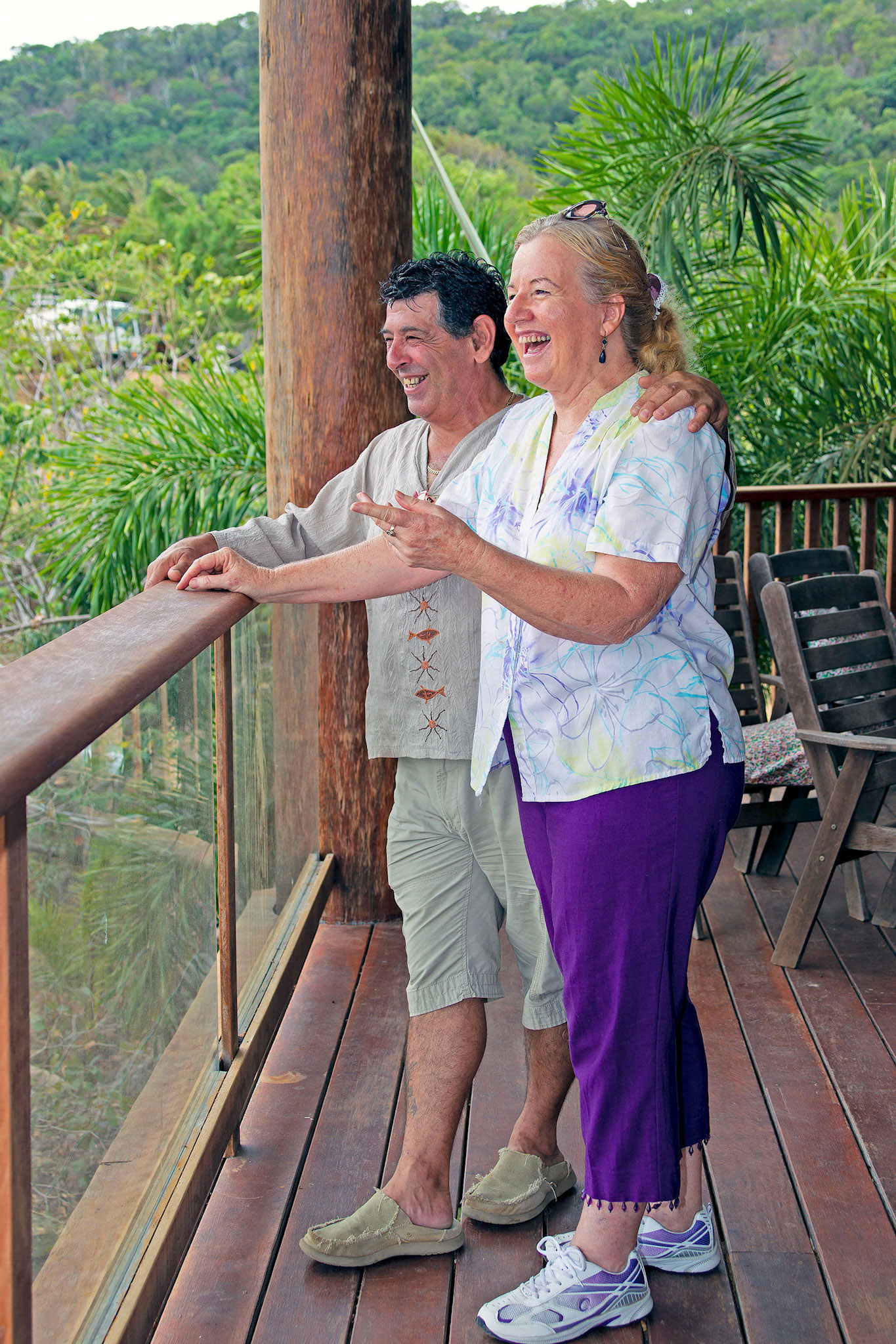 laughing couple standing timber balcony© copyright-lewis-a-collins-lcpmtl-! http://lewiscollins.com.au