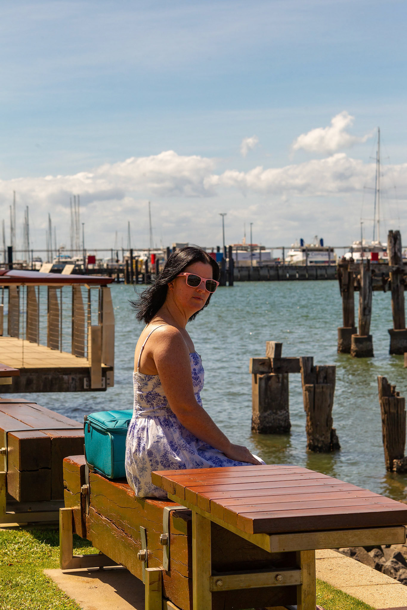 lady sitting on log looking at camera suite case sunglasses pretty summer blue white dress  © copyright-lewis-a-collins-photographer-!http://lewiscollins.au