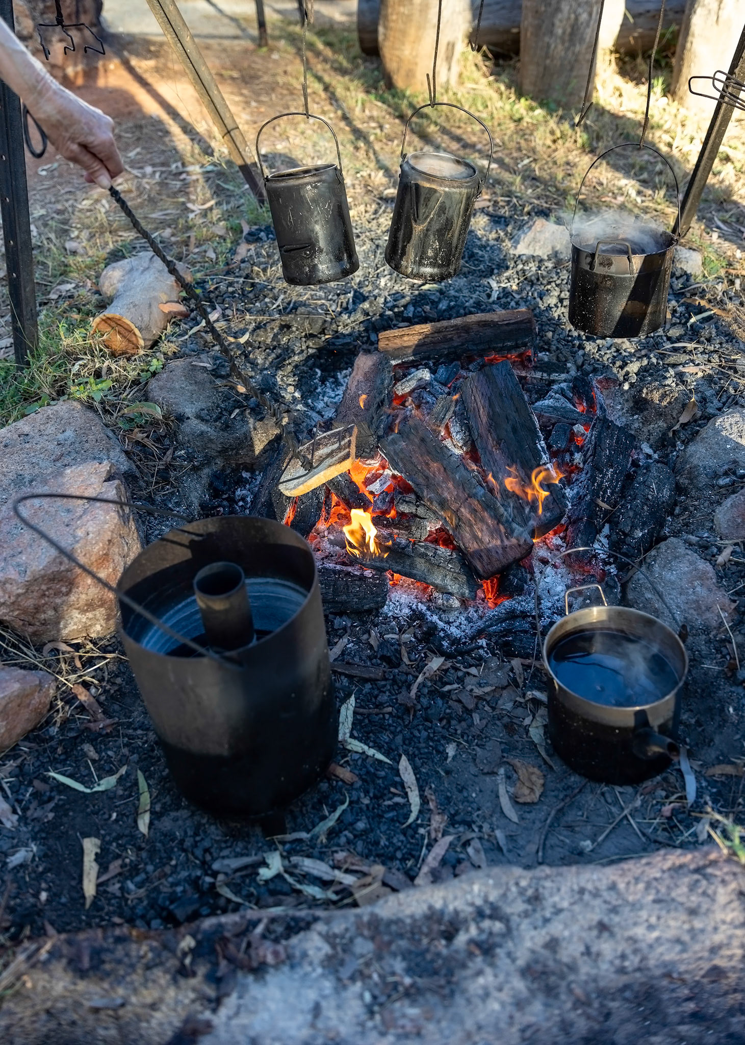2024 april coffee steaming hot toasting bread over open fire undara volcanic national park mount surprise queensland australia, © copyright lewis a collins ! http://lewiscollins.au