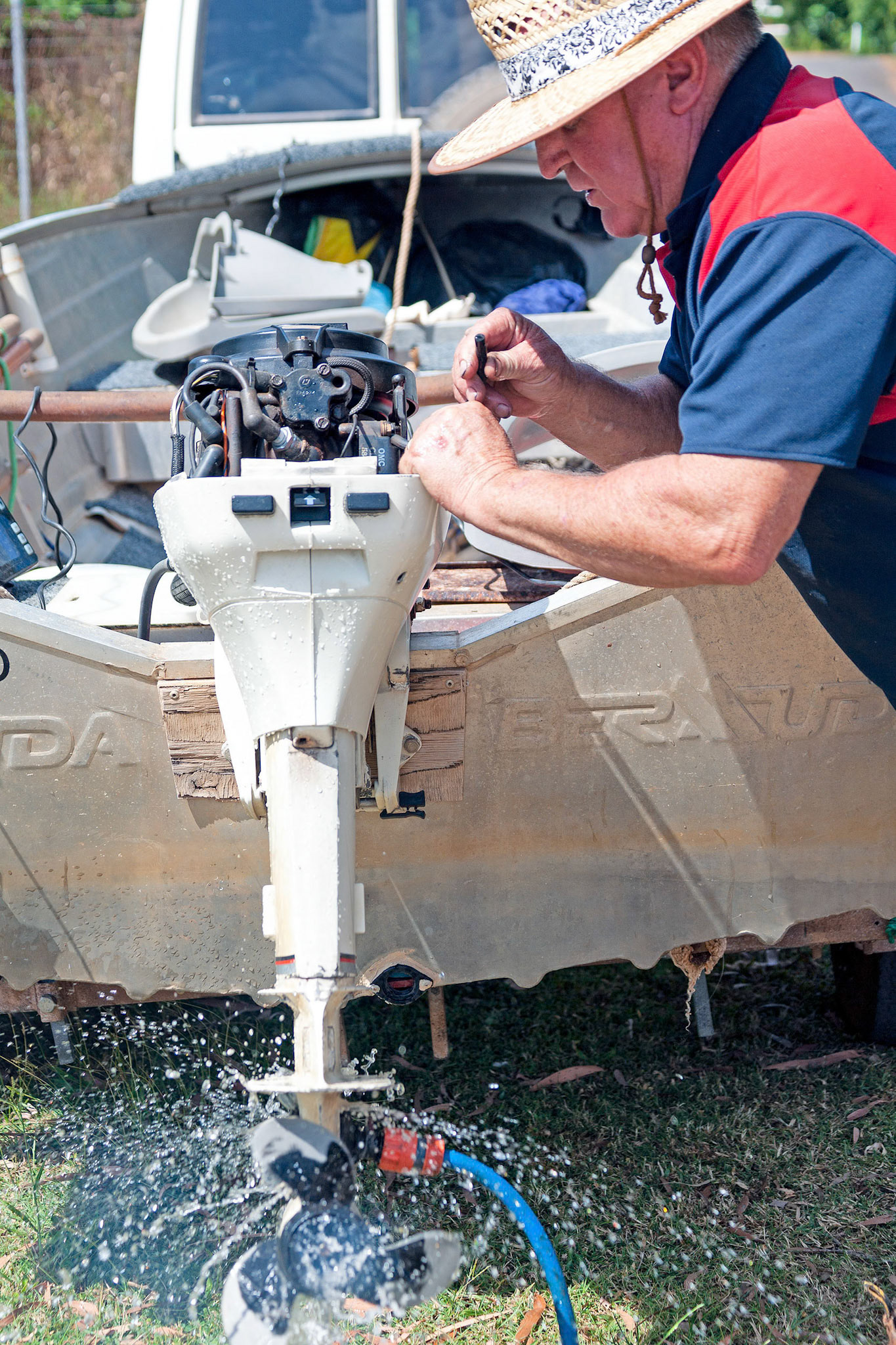 man outboard propeller spinning around water spraying out© copyright-lewis-a-collins-lcpmtl-! http://lewiscollins.com.au