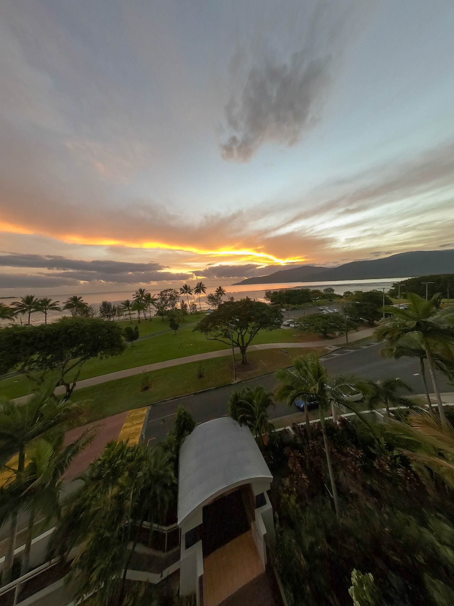 view across cairns north esplanade sun line glow sunrise morning cairns queensland (QLD) australia   © copyright-lewis-a-collins-photographer-! http://lewiscollins.com.au