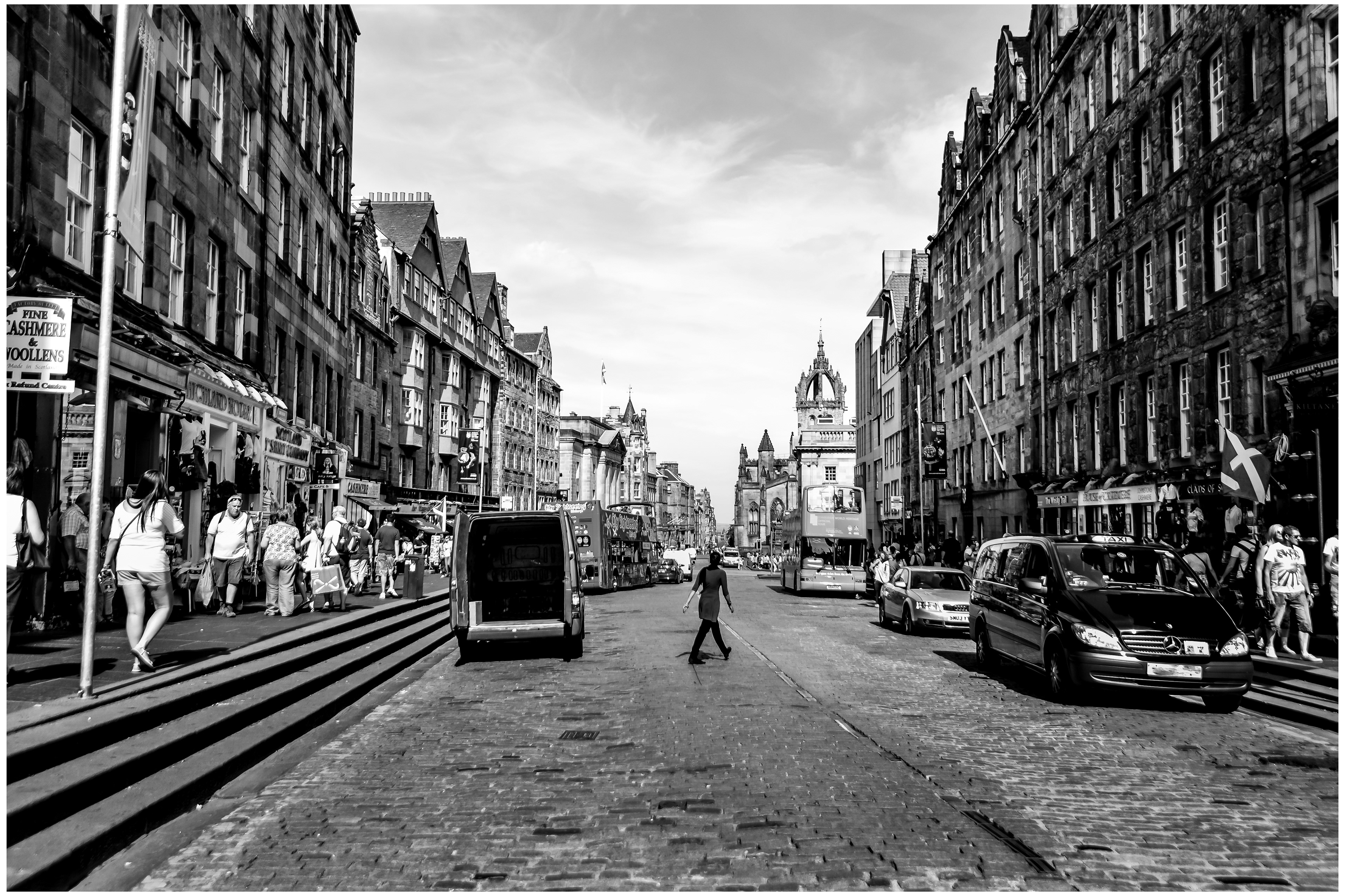 From a road trip back in 2018 and passing through Edinburgh, this street is called the Royal Mile and is a succession of streets forming the main thoroughfare of the Old town of the city of Edinburgh in Scotland. The street runs between 2 significant locations of Royal history: Edinburgh Castle and Holyrood Palace. Might I add the street here is always buzzing.