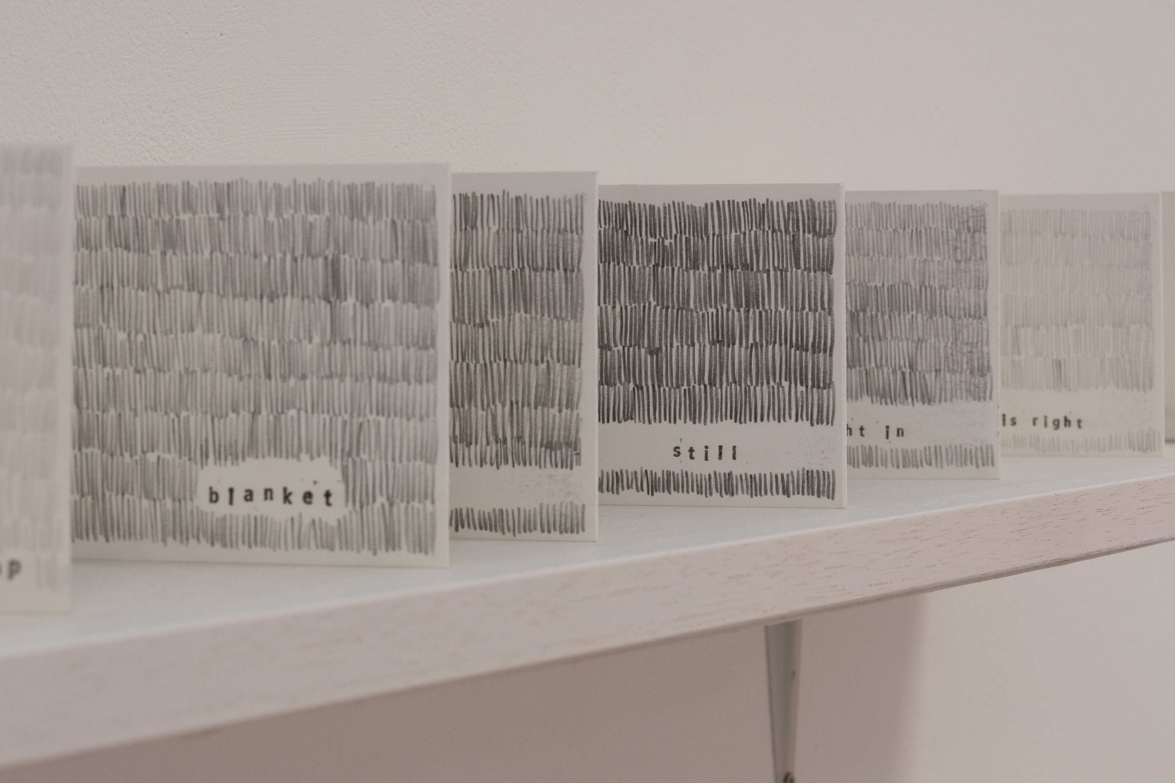 "Sometimes, Sometimes", pencil drawing and hand-stamped accordion book