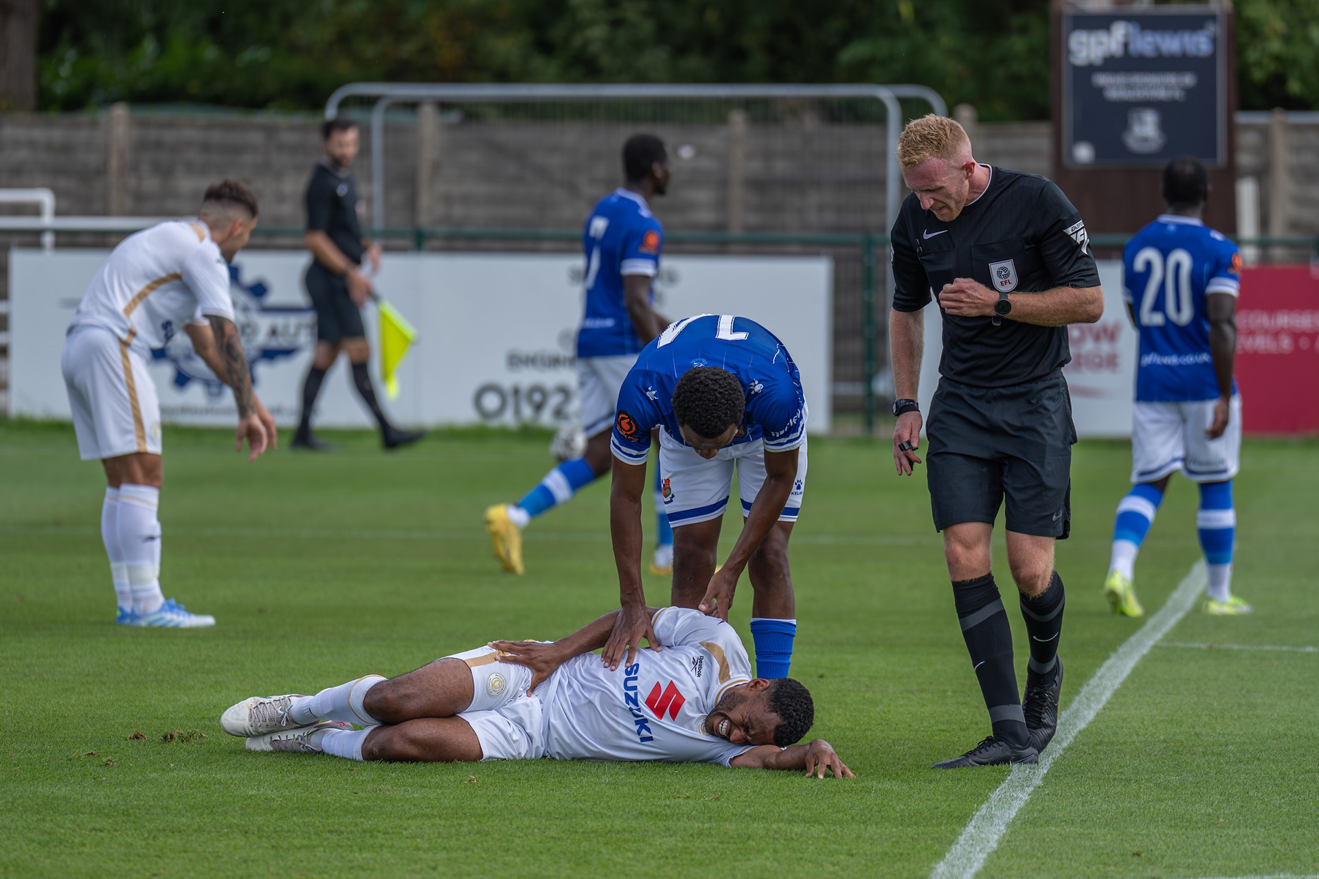 Micah Obiero checks on the health of his opponent