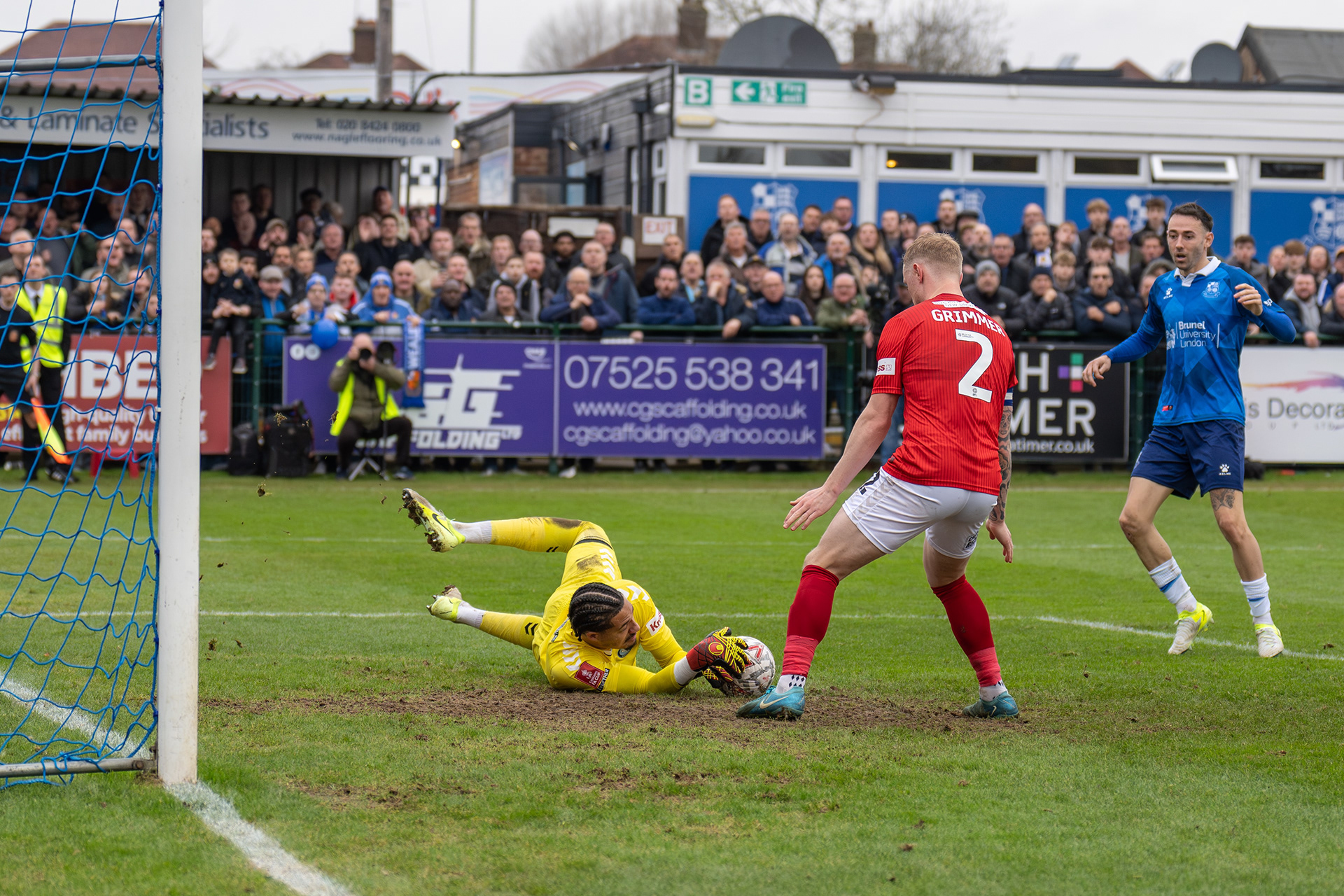 ....saves low down to his right!