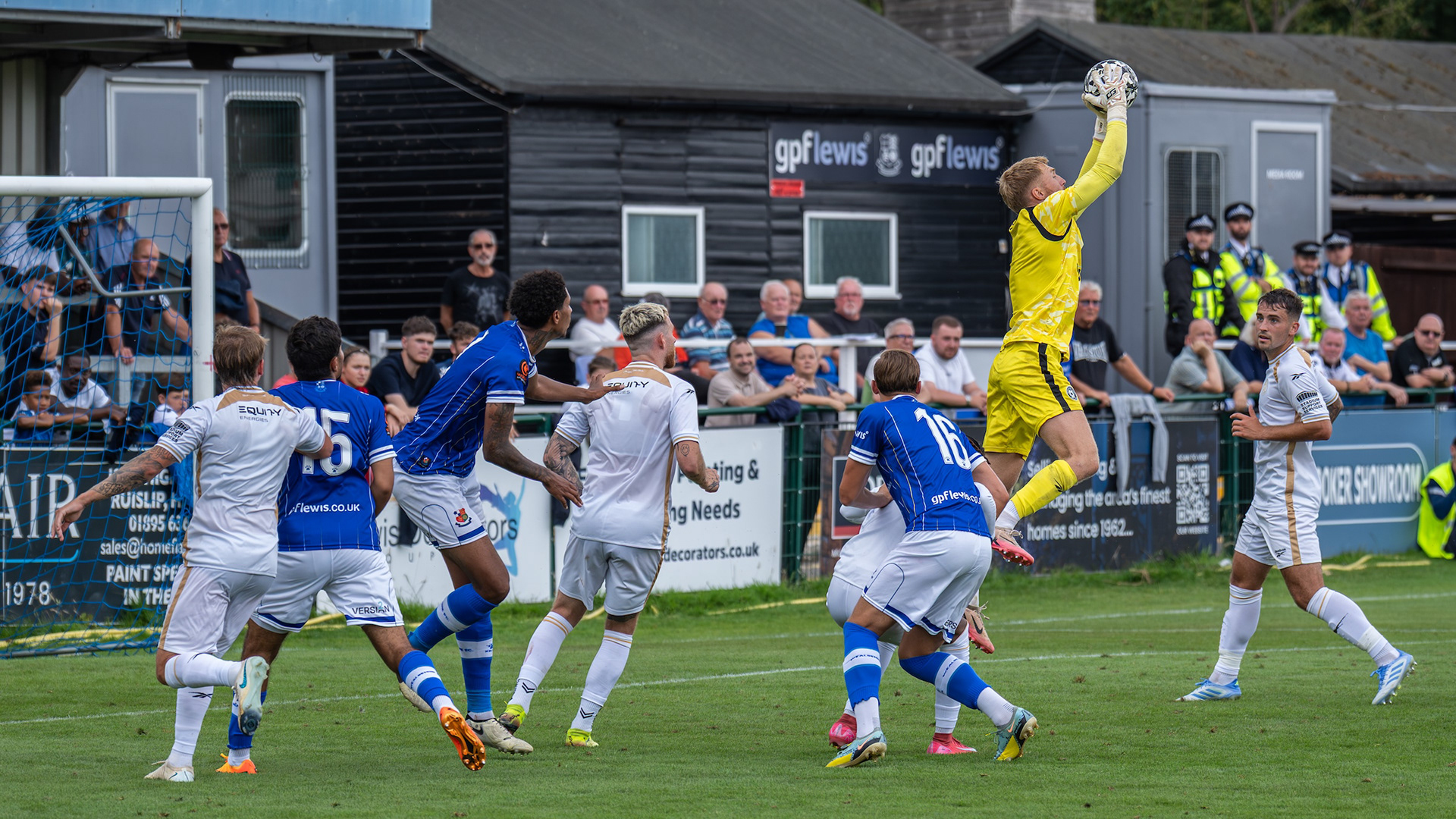 MK Dons keeper claims a cross