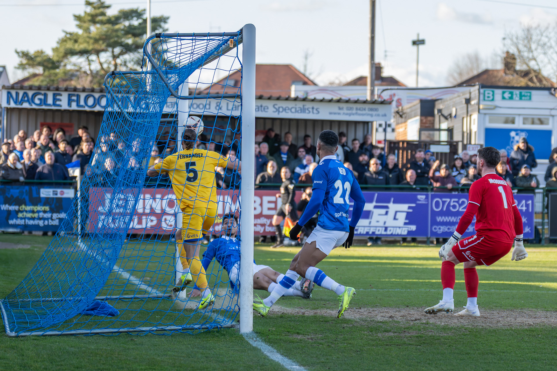 ....and watches on as his shot heads towards goal......