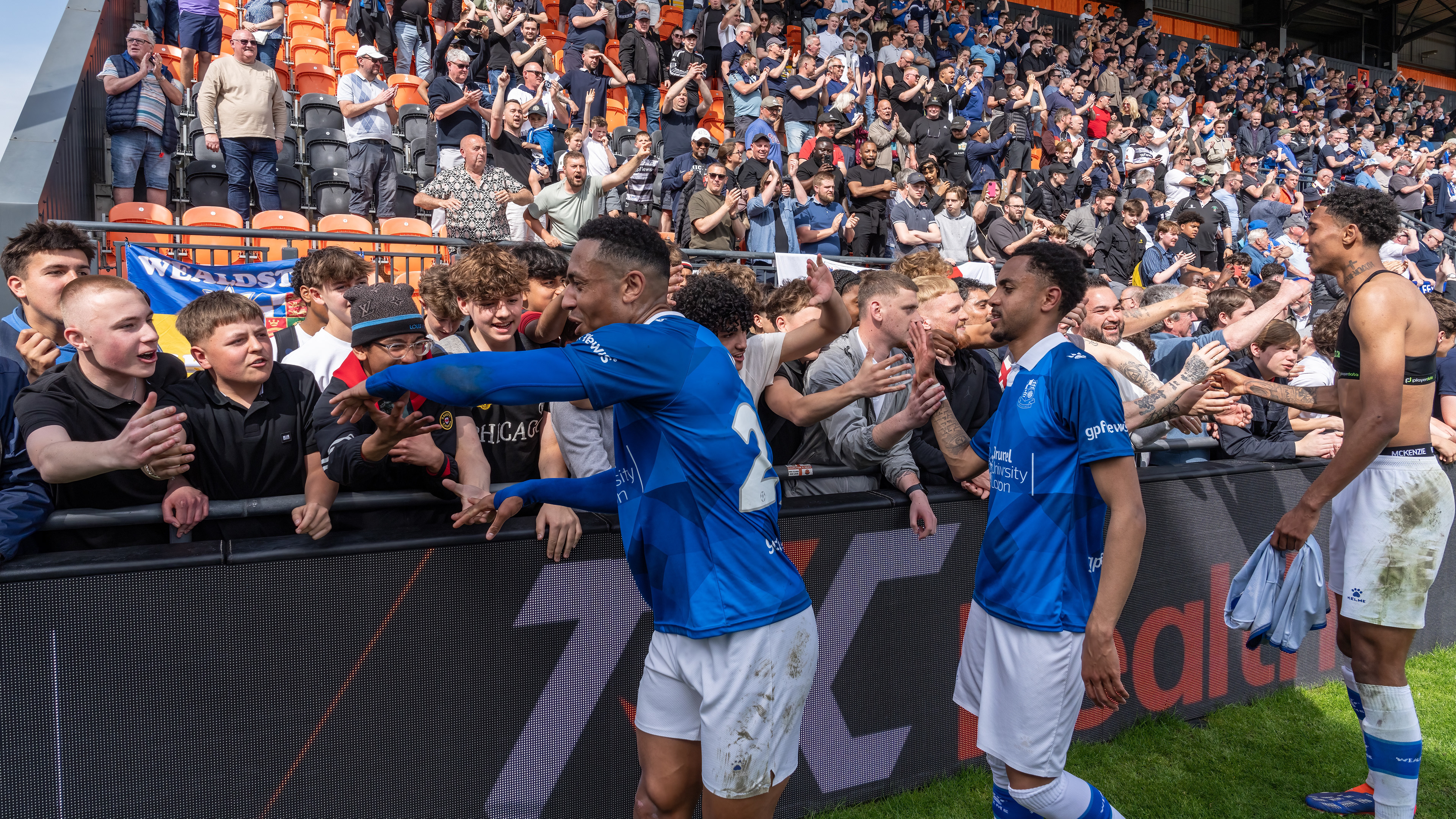 Alex Reid, Harrison Sohna & Deon Woodman celebrate with the Stones faithful