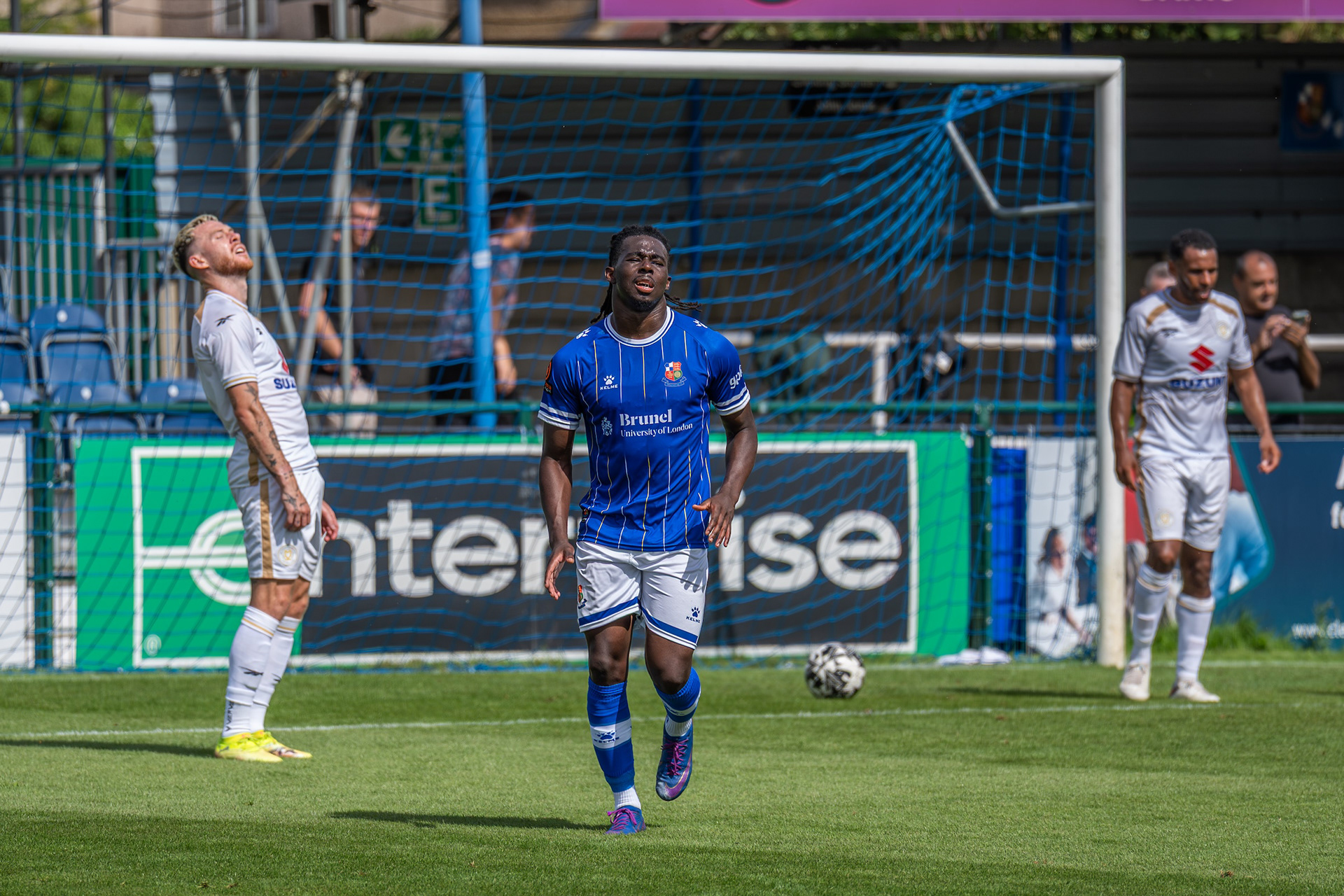 MK Dons defenders despair!