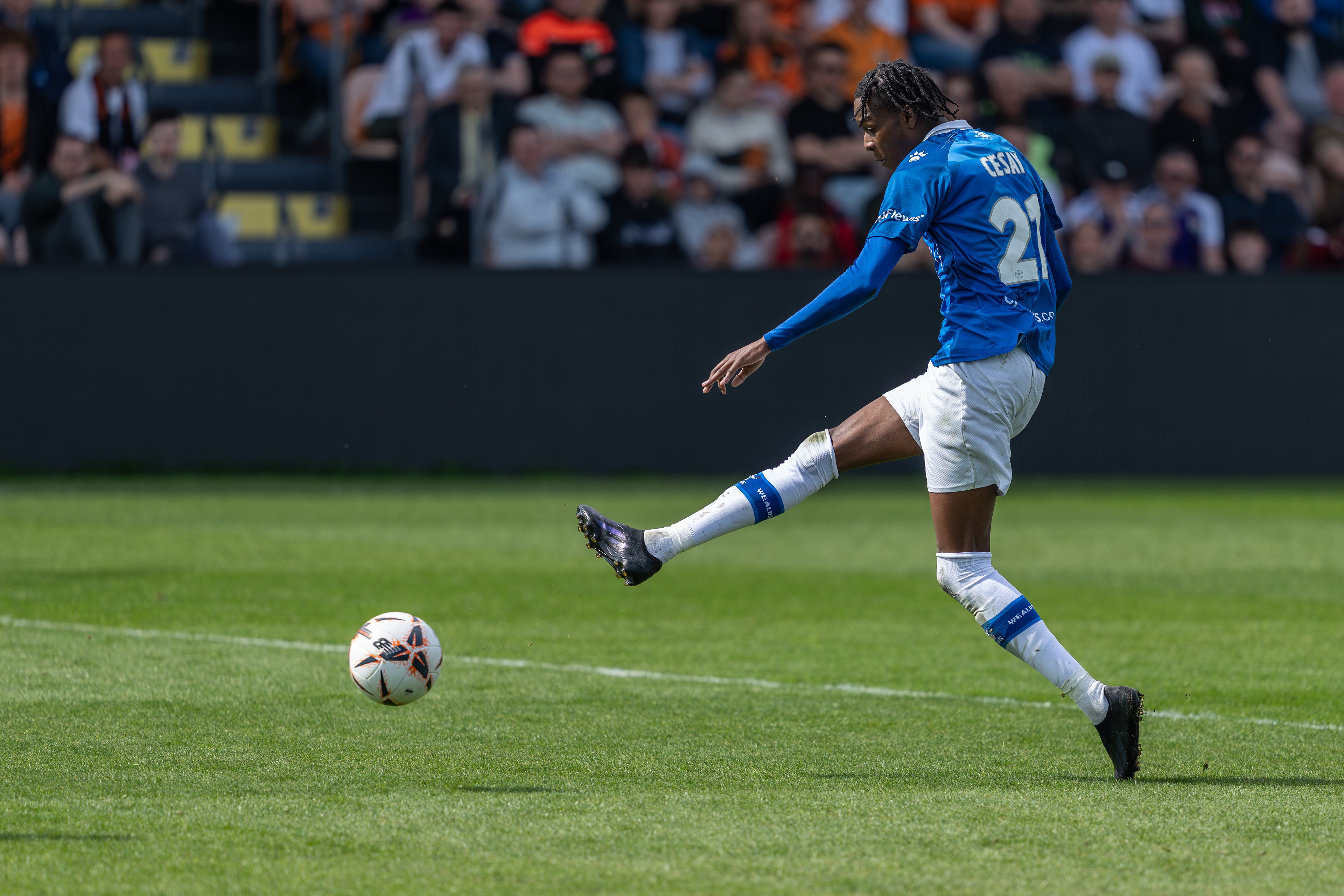 ......and fires his shot towards goal.....