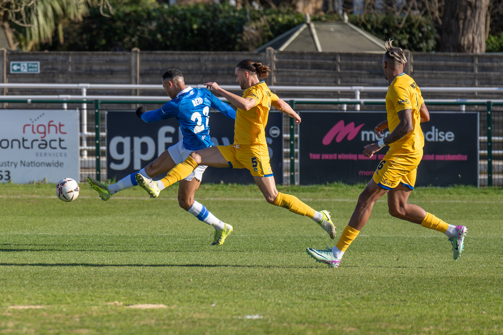 Alex Reid unleashing a fierce shot at goal