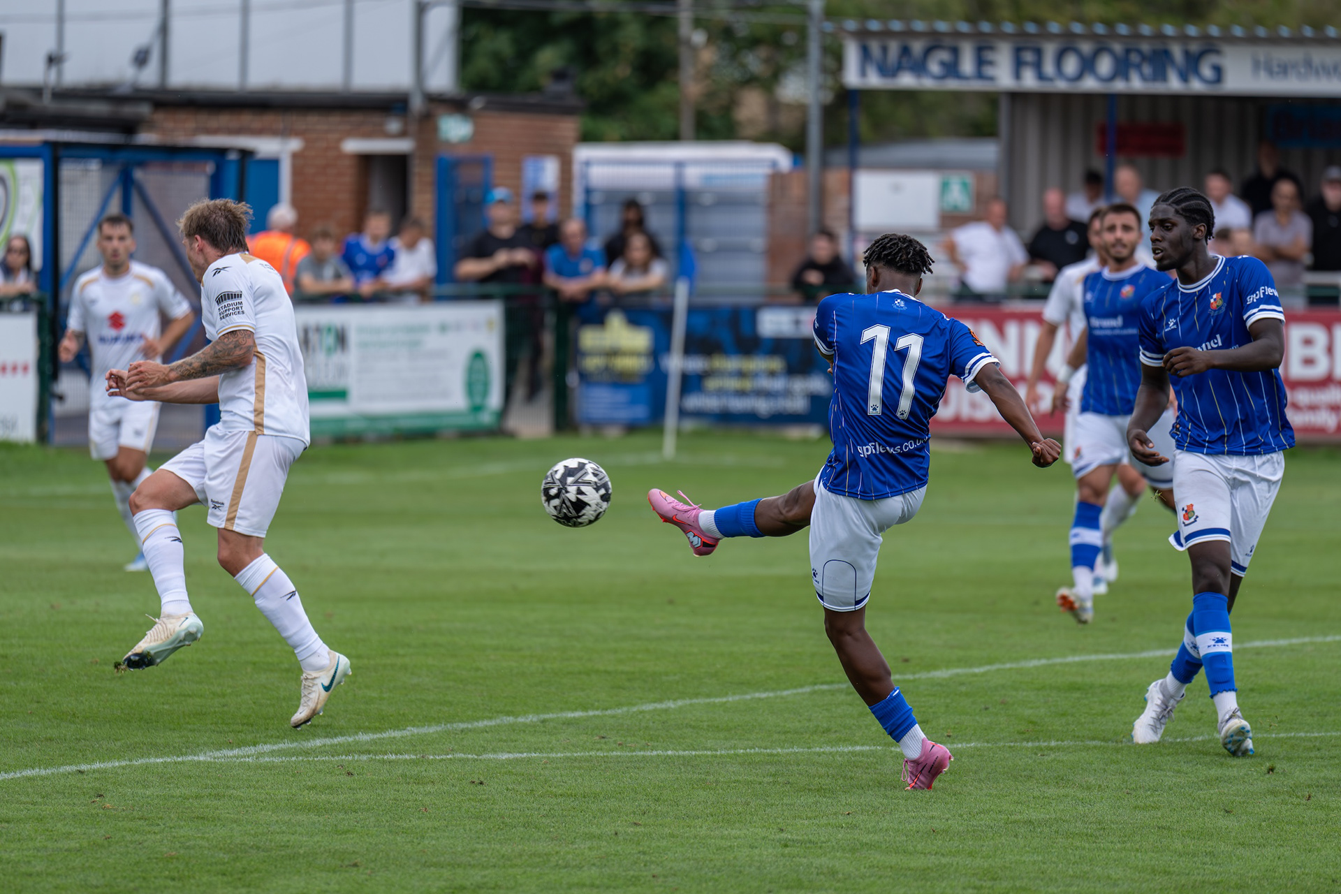 Sak Hassan strikes a fierce shot at goal