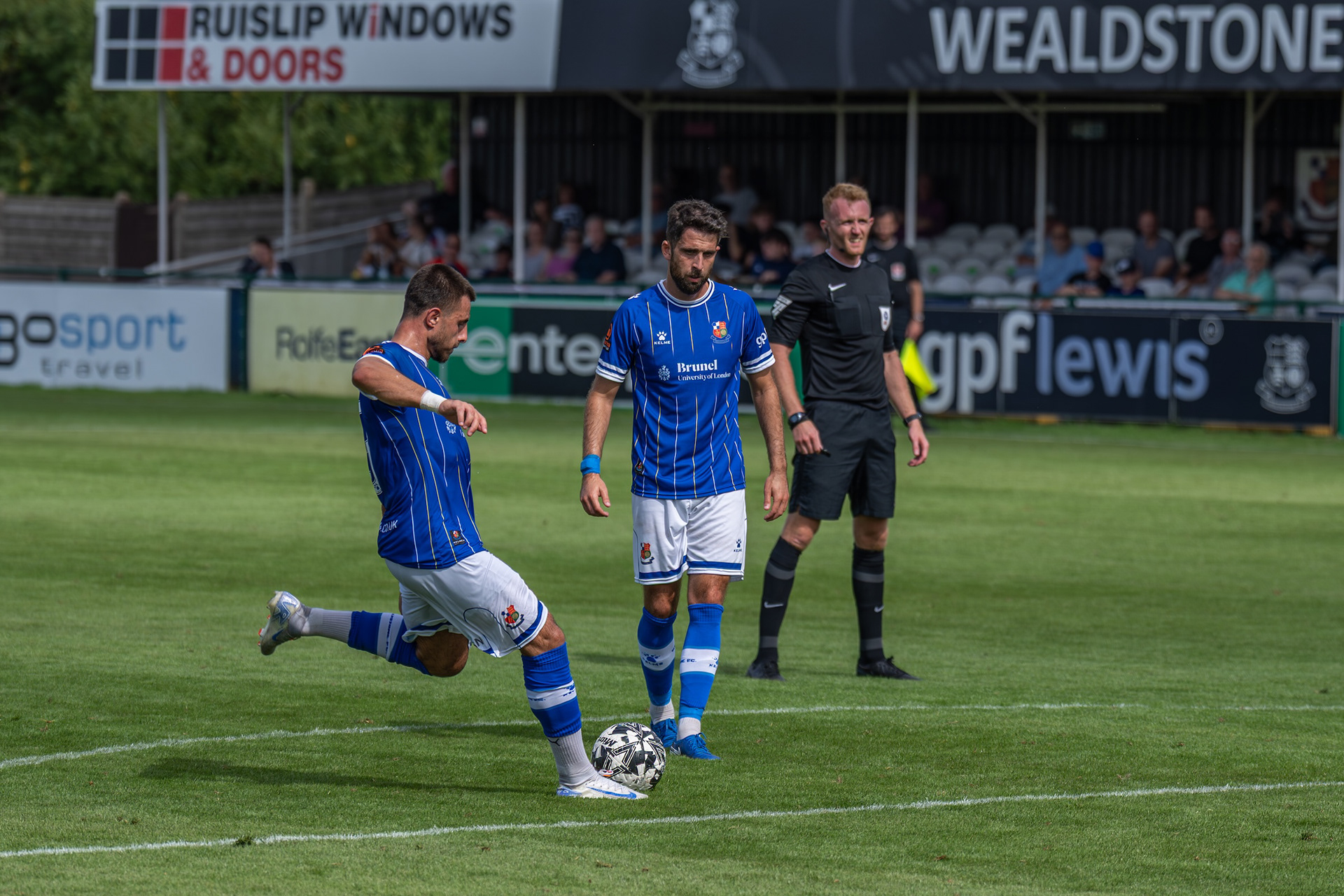 Anthony Georgiou strikes the resulting free kick....