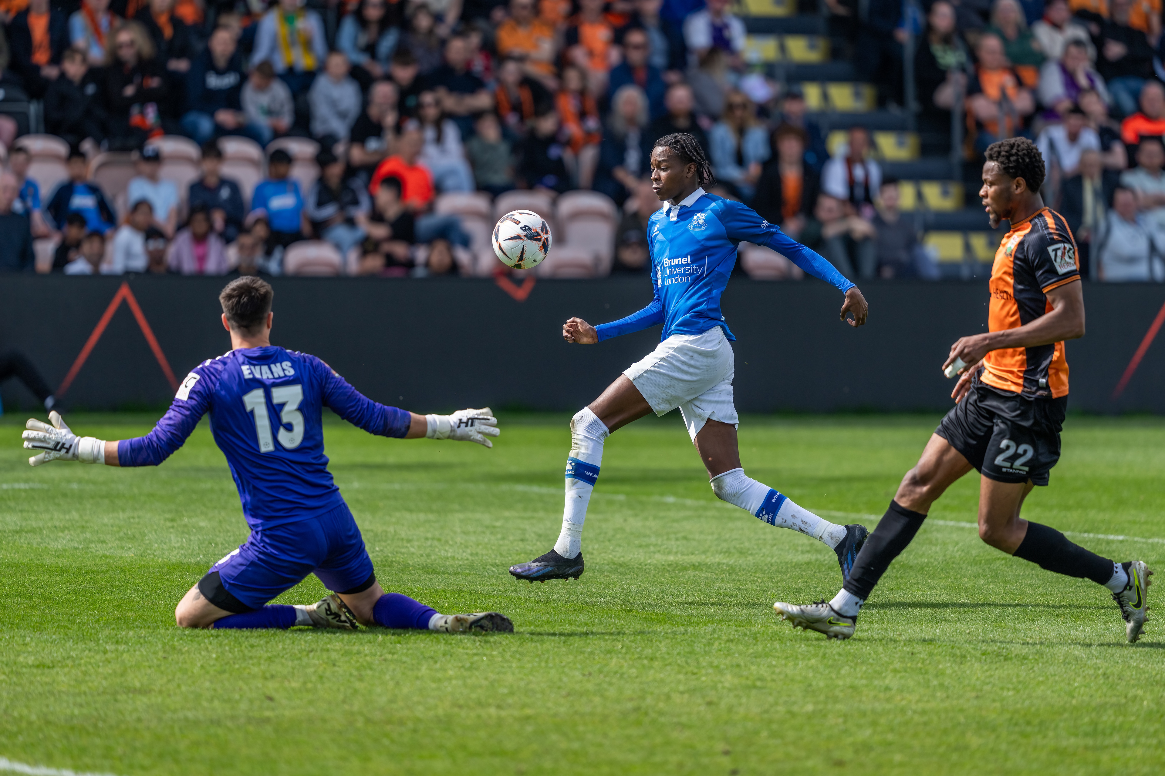 ......which Bees stopper Evans does brilliantly to save